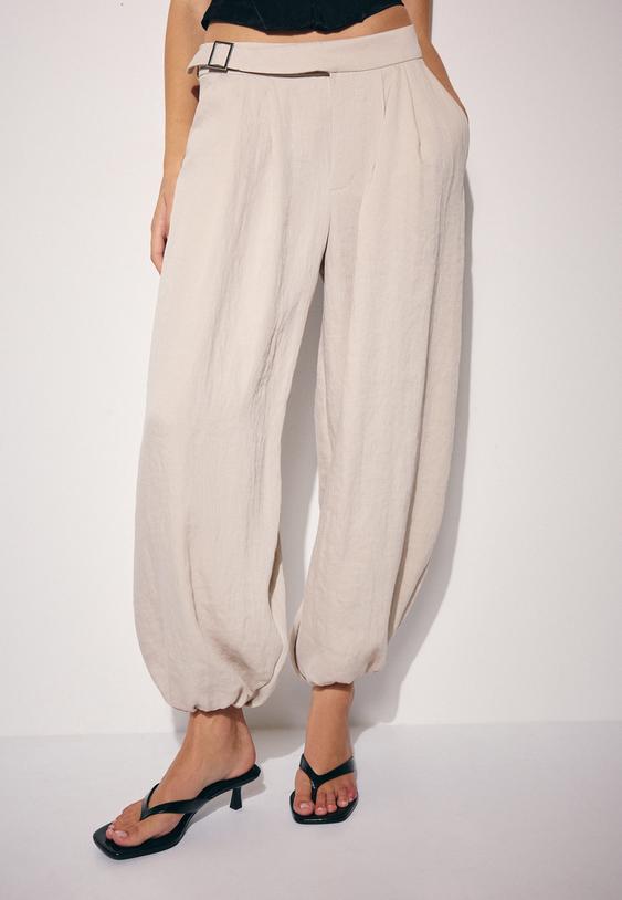calcas estilo bombachas com fivela