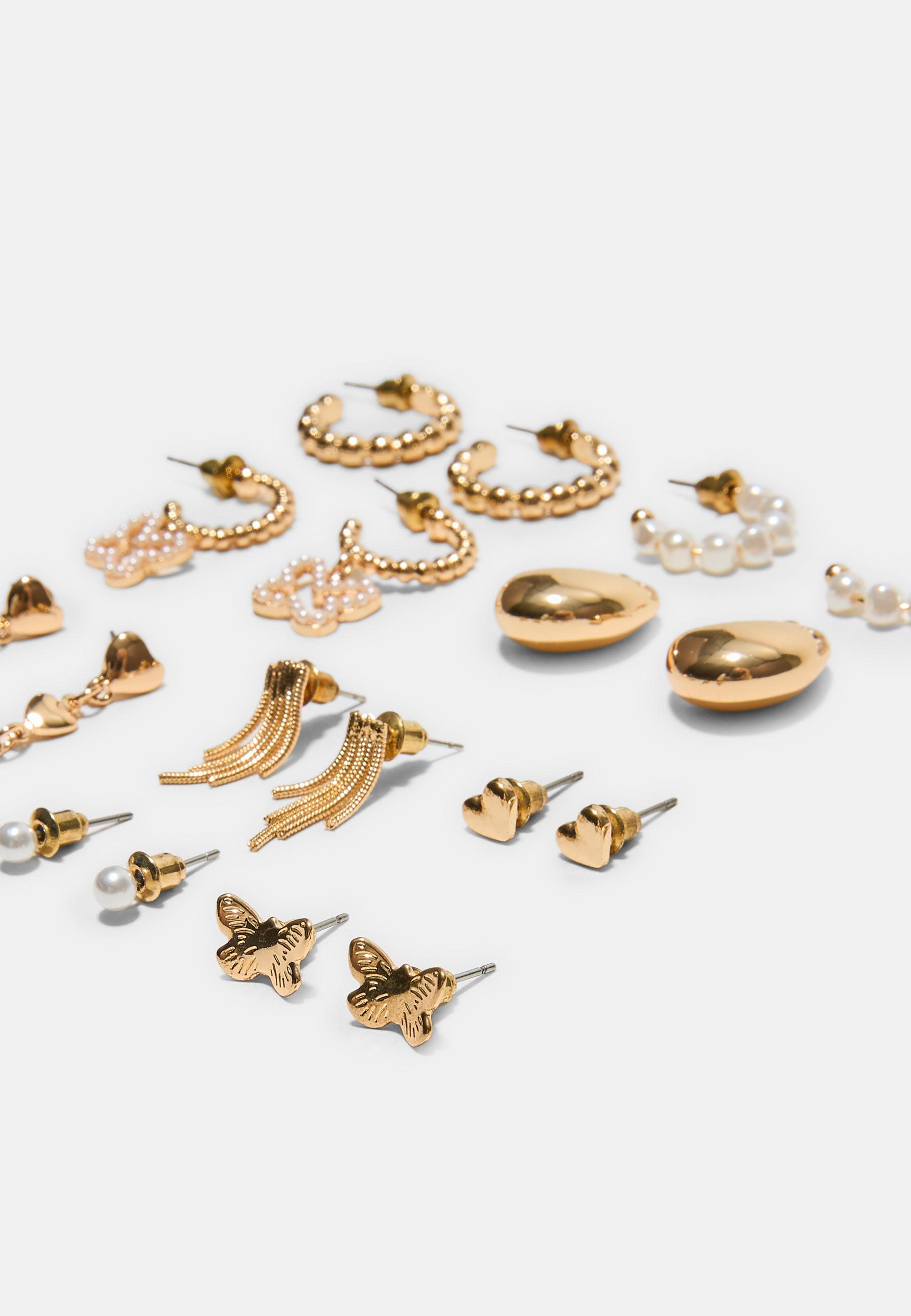 Set of 9 butterfly and faux pearl earrings — Gold