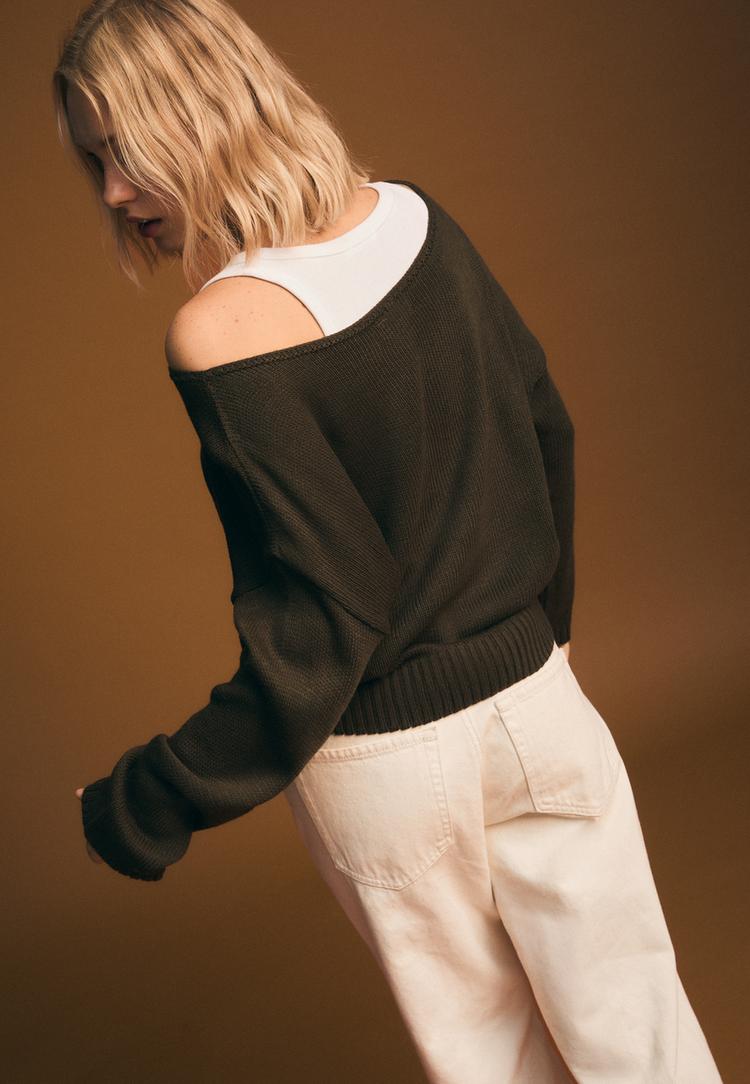 asymmetric knit sweater with star