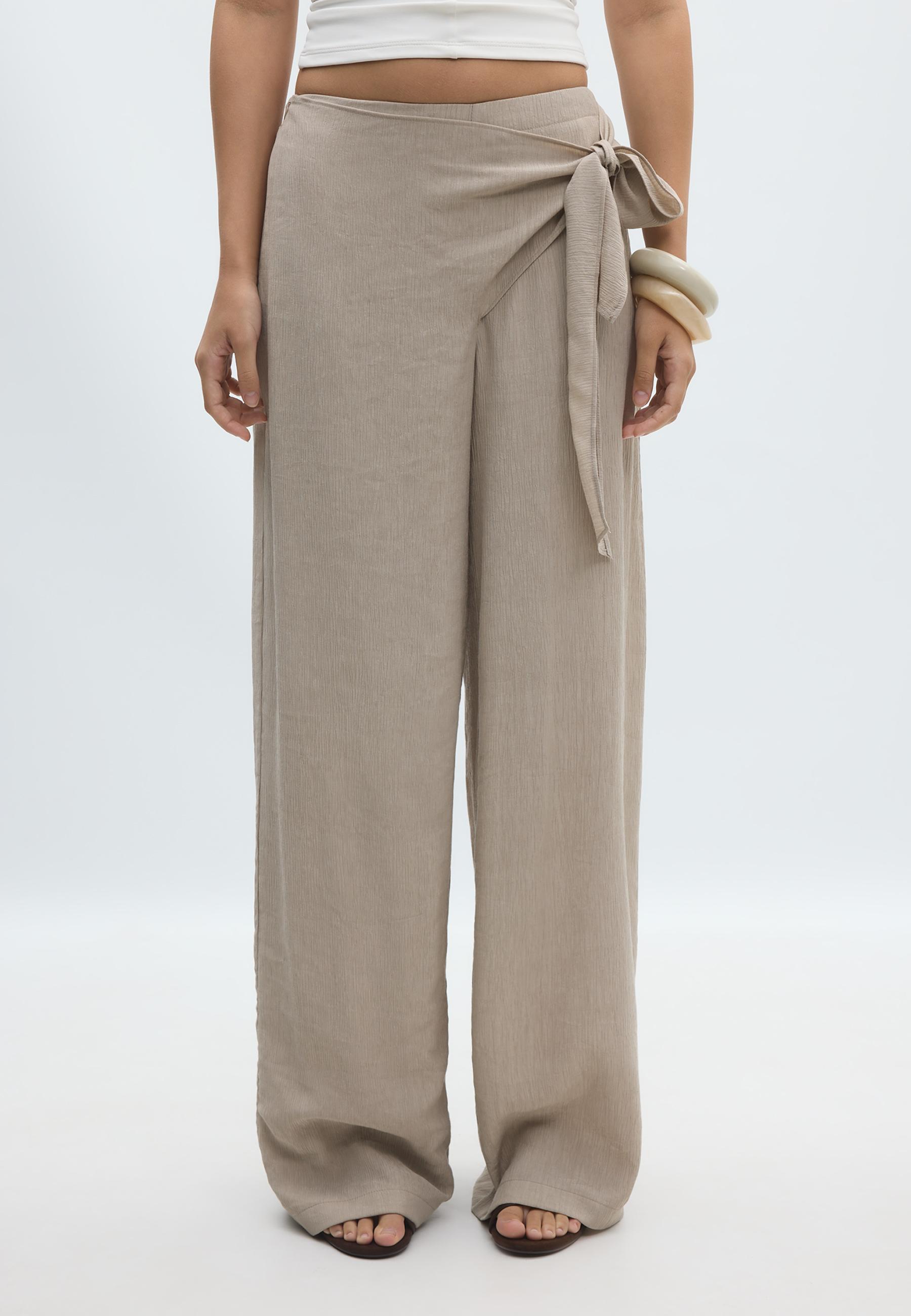 Stone sarong-style flowy pants set, mid-rise, wide leg, side zipper closure, and front tie.