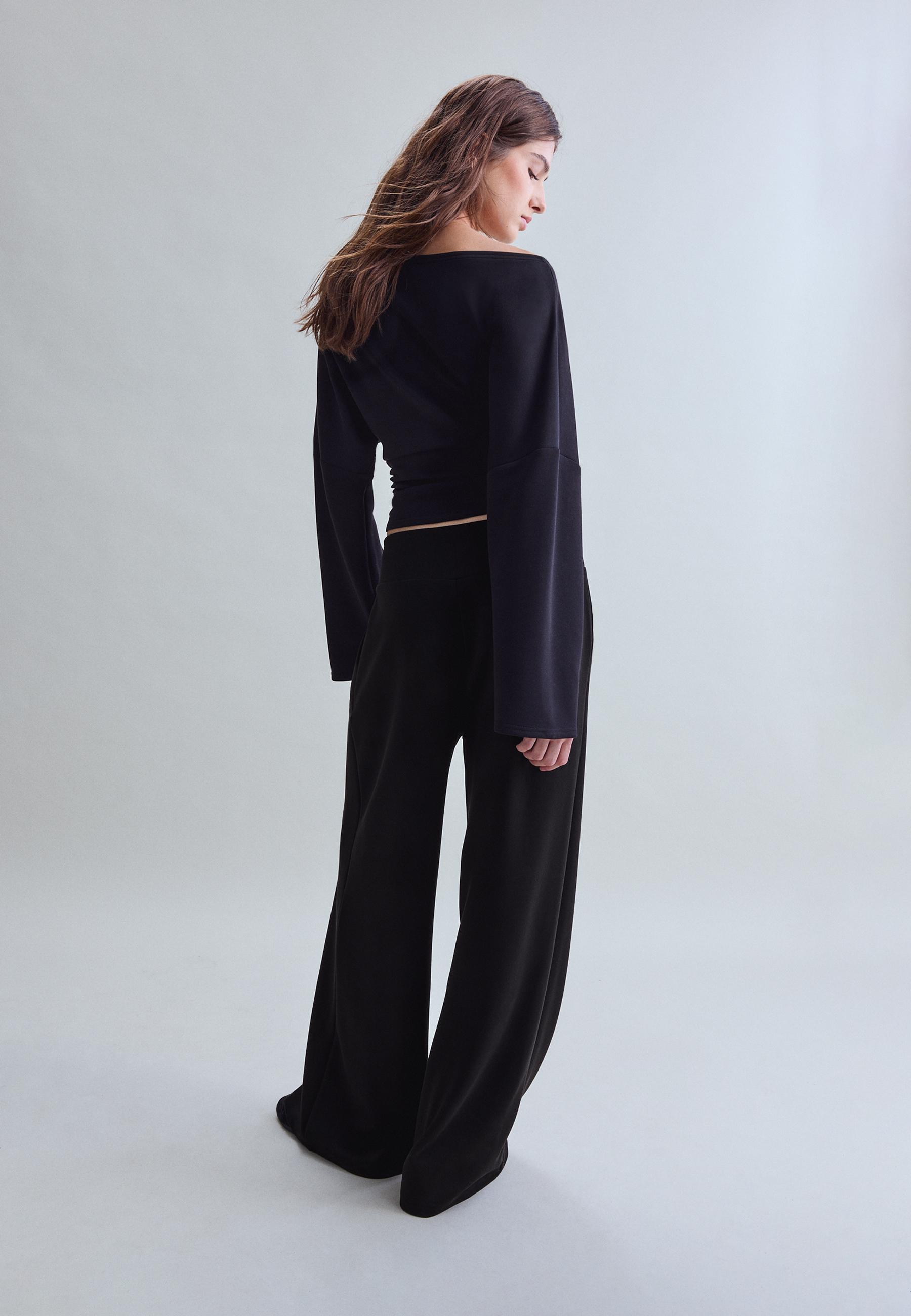 Soft-touch wide-leg trousers with darts — Black