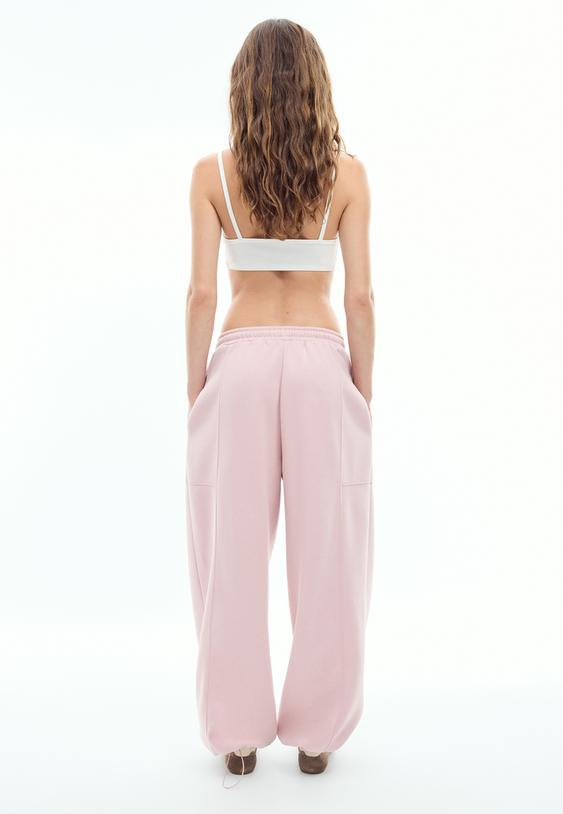 calcas jogger barrel em felpa com stoppers