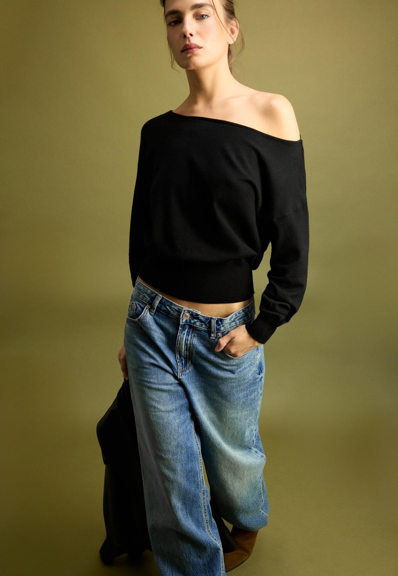 Asymmetric knit jumper — Black