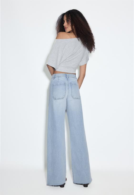 jeans calcas direitas com bolsos