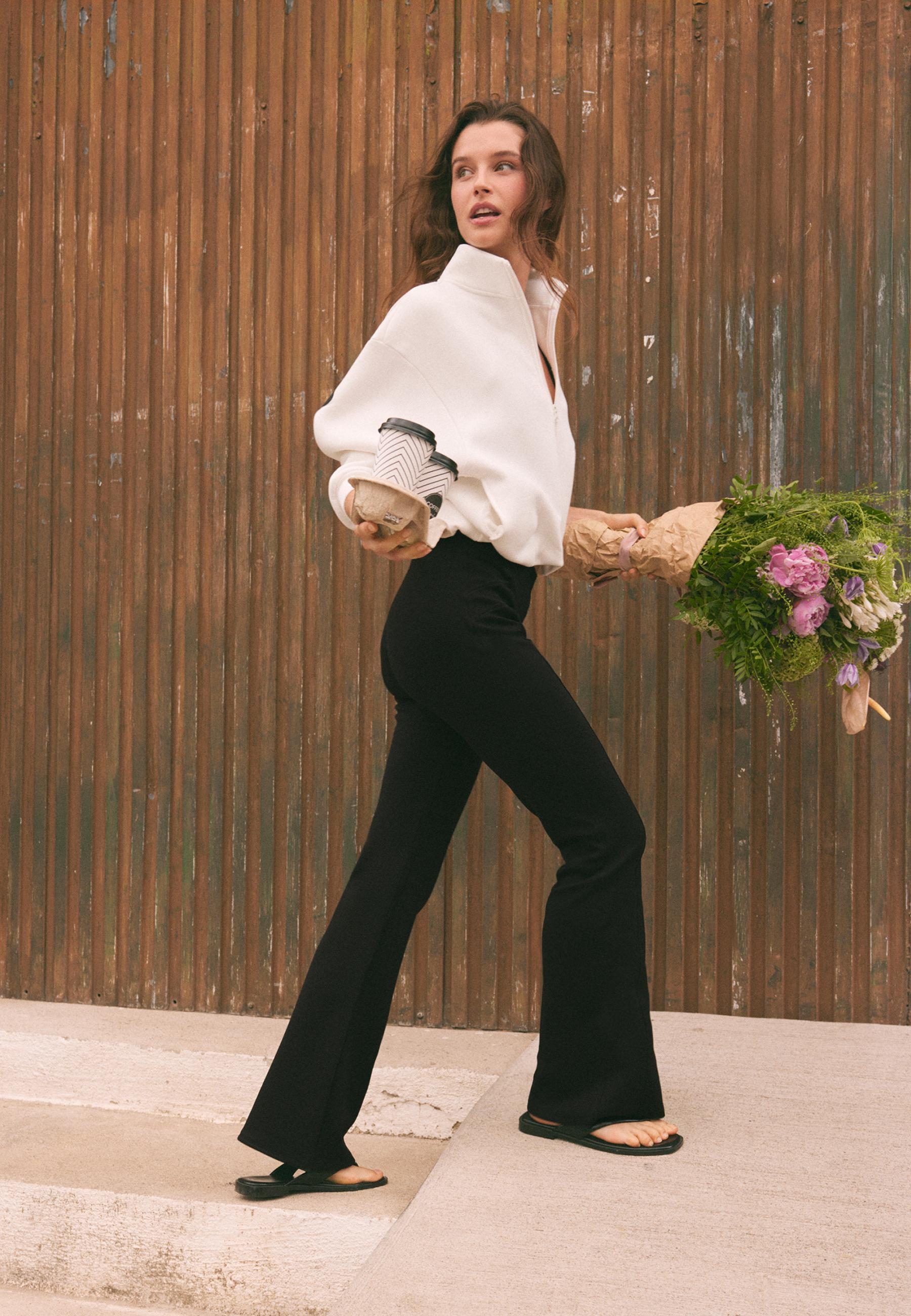 Cotton blend bell bottom leggings with seam detail — Black