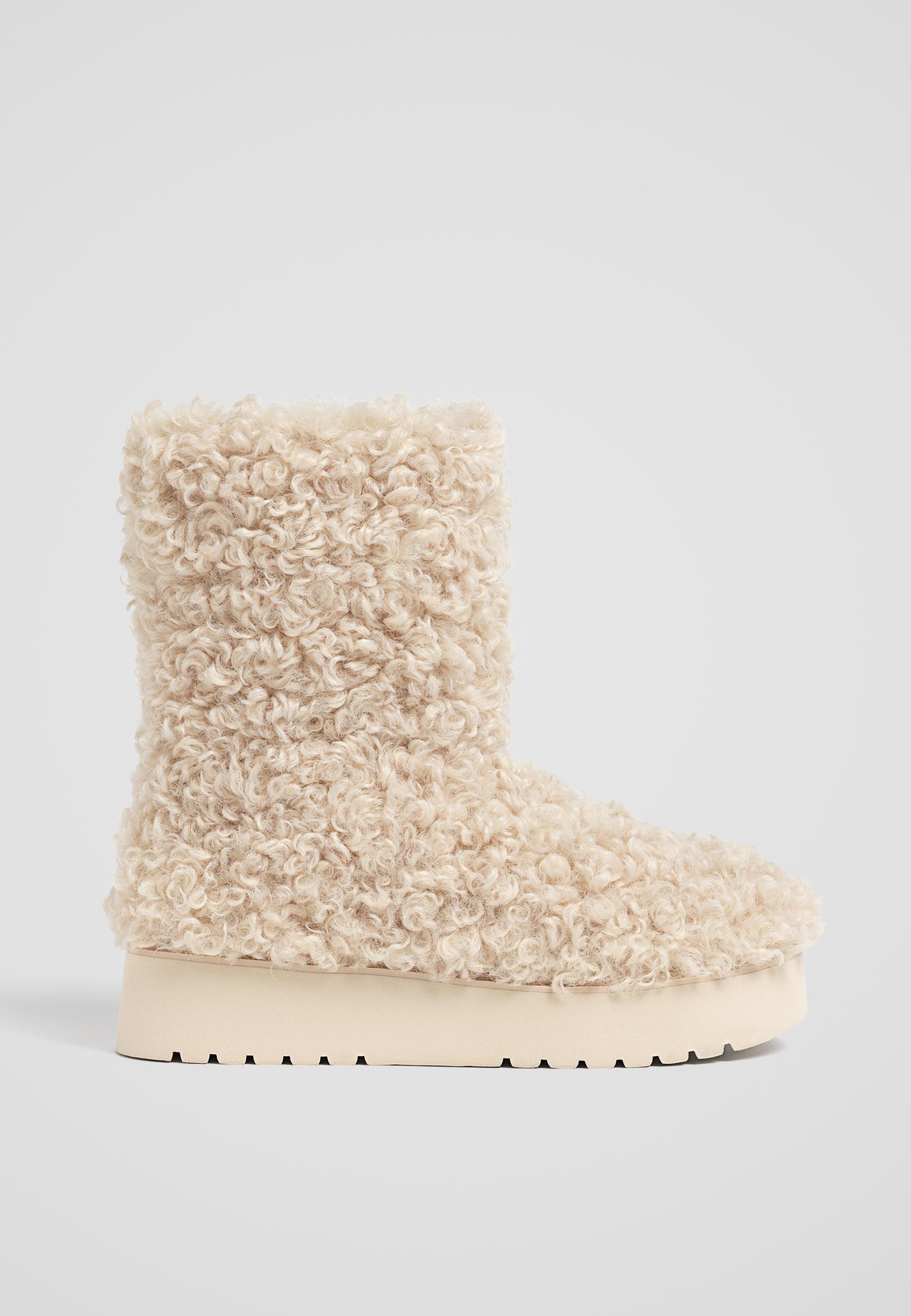 Flat faux shearling lined ankle boots