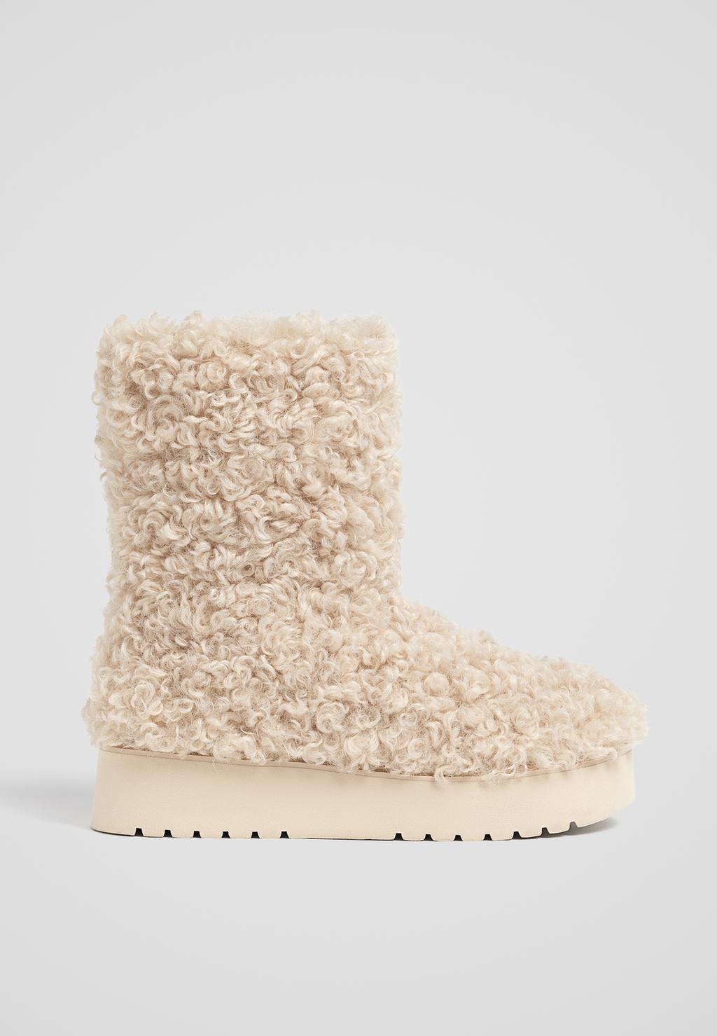 Flat faux shearling lined ankle boots