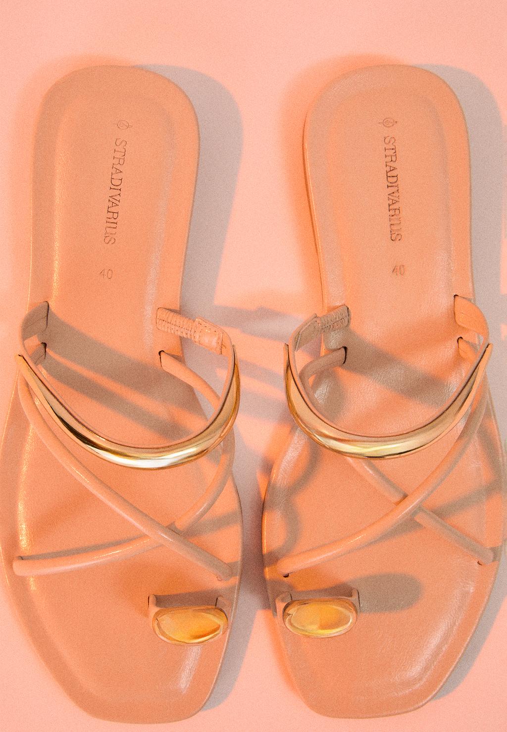 Flat sandals with metal detail