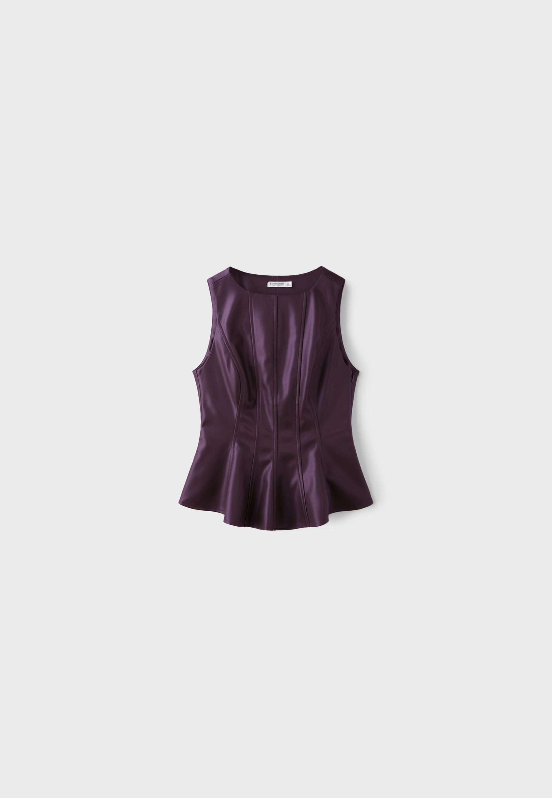 Top sin mangas peplum efecto piel