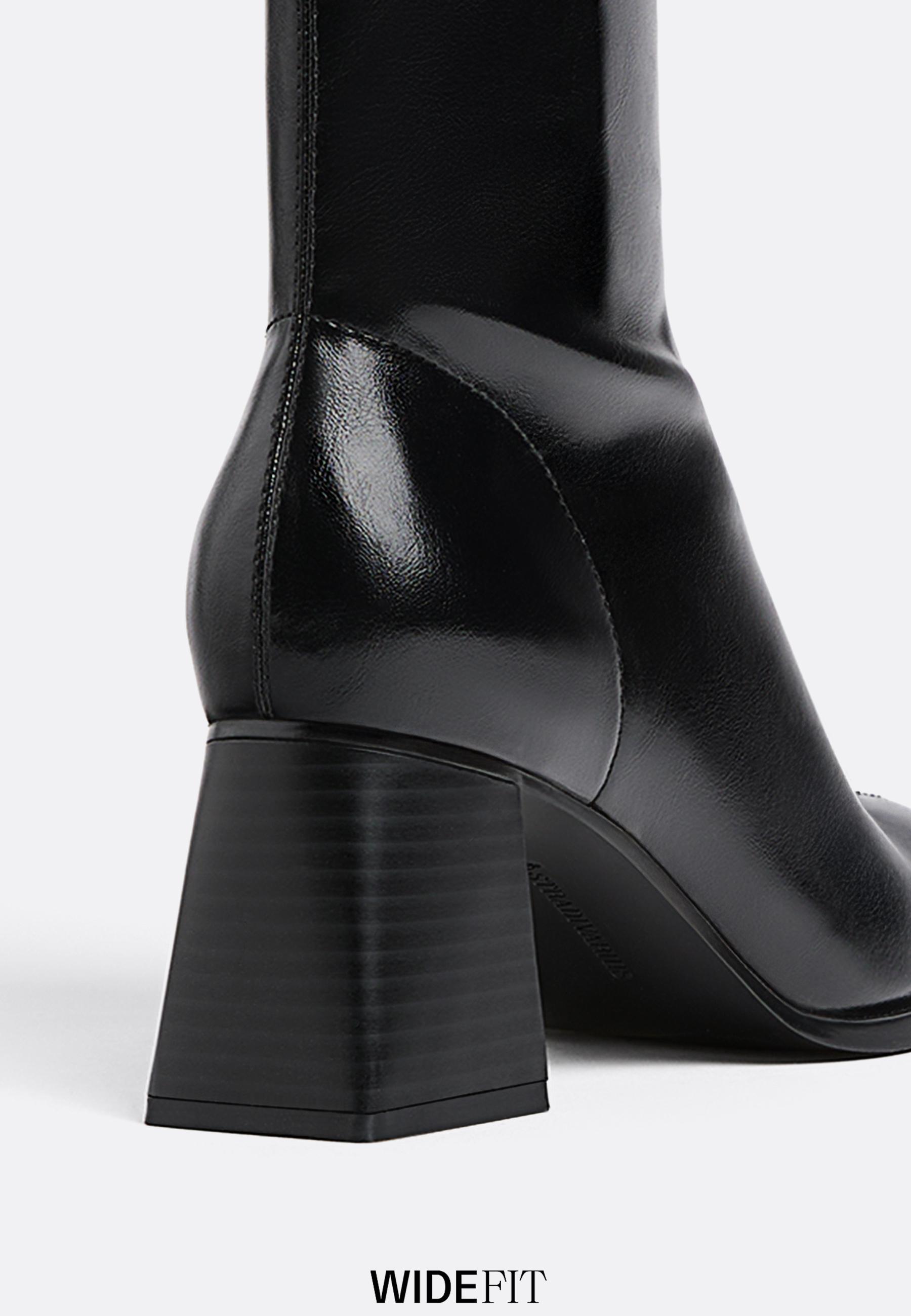 Mid-heel boots with stretch legs — BLACK