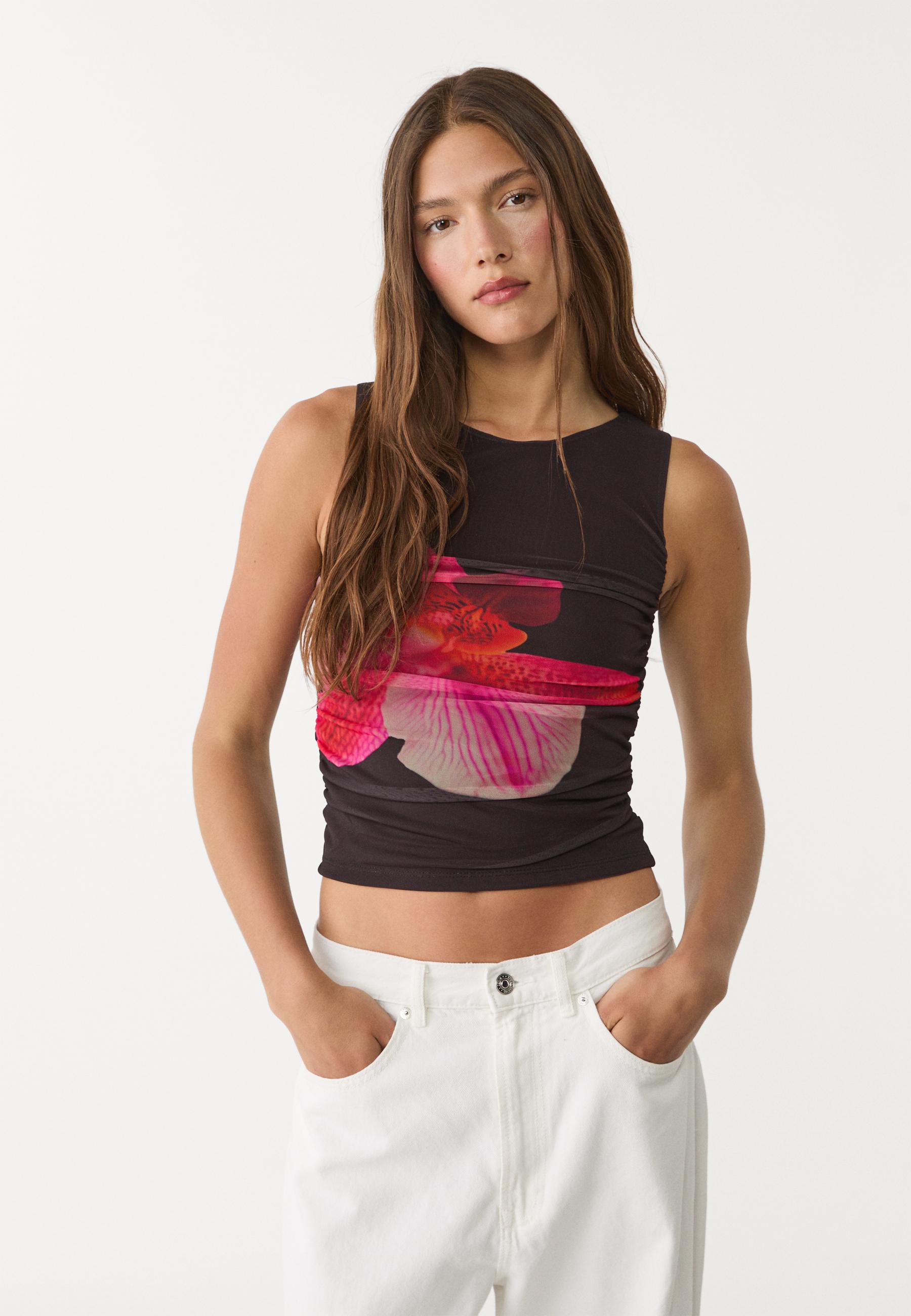Tulle top with hibiscus details - Women's fashion