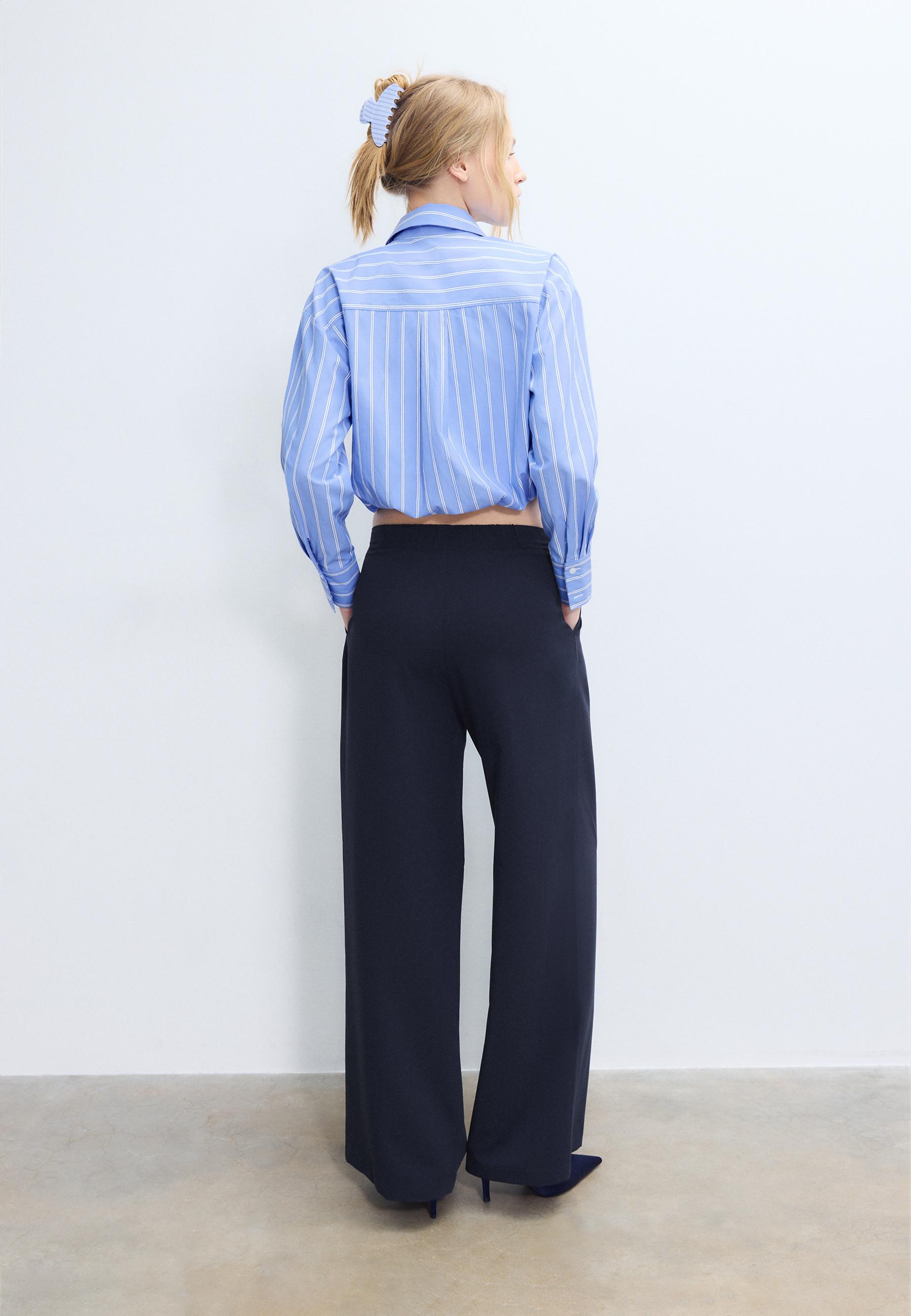 Wide-leg trousers with buckle detail — Blue