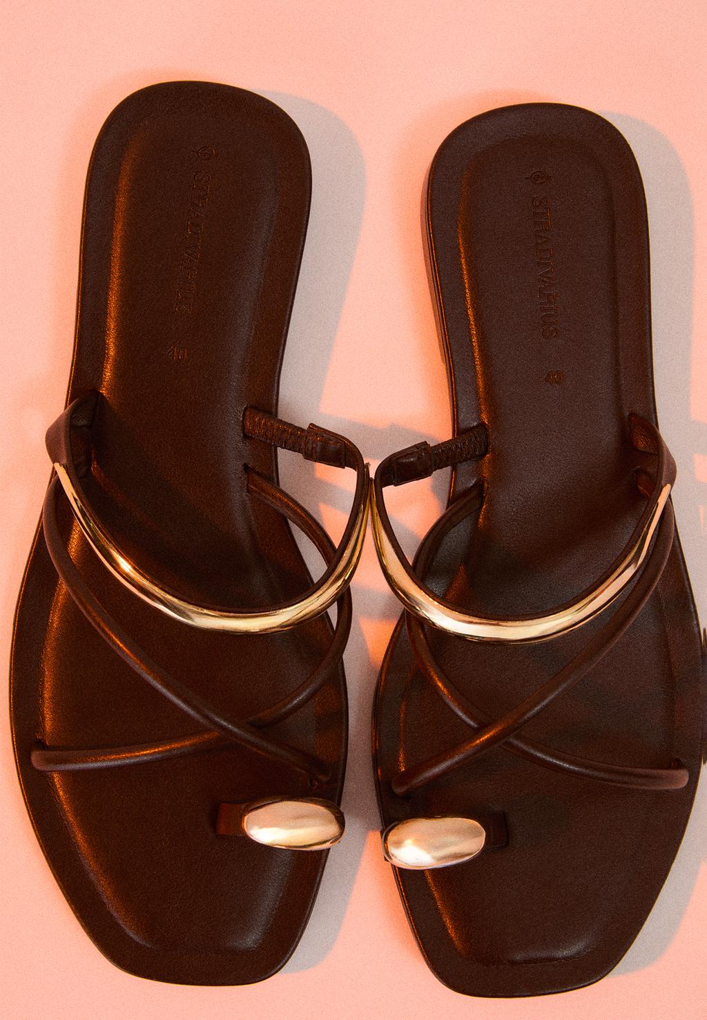 Flat sandals with metal detail