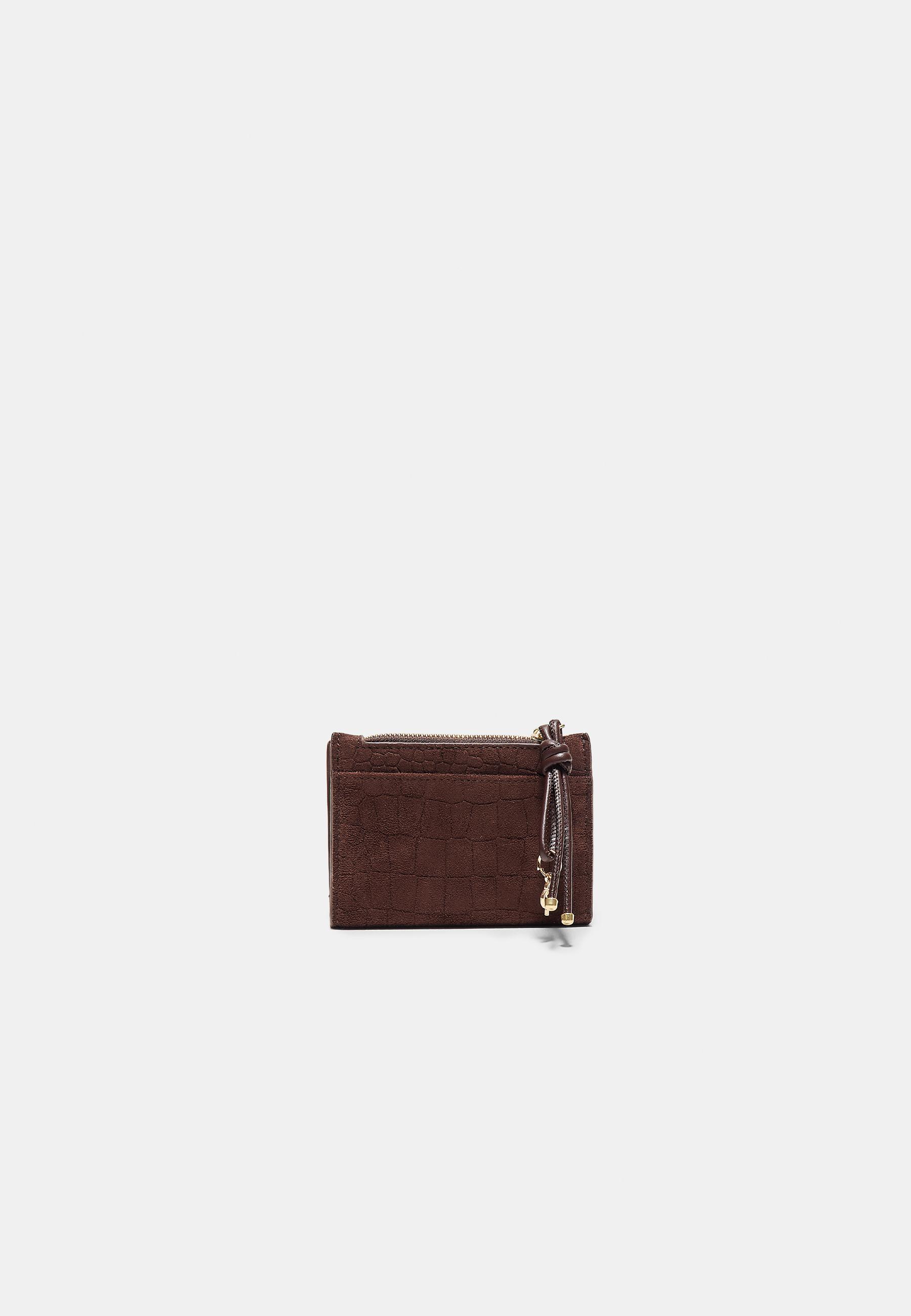 Purse with embossed pull tab detail — Brown