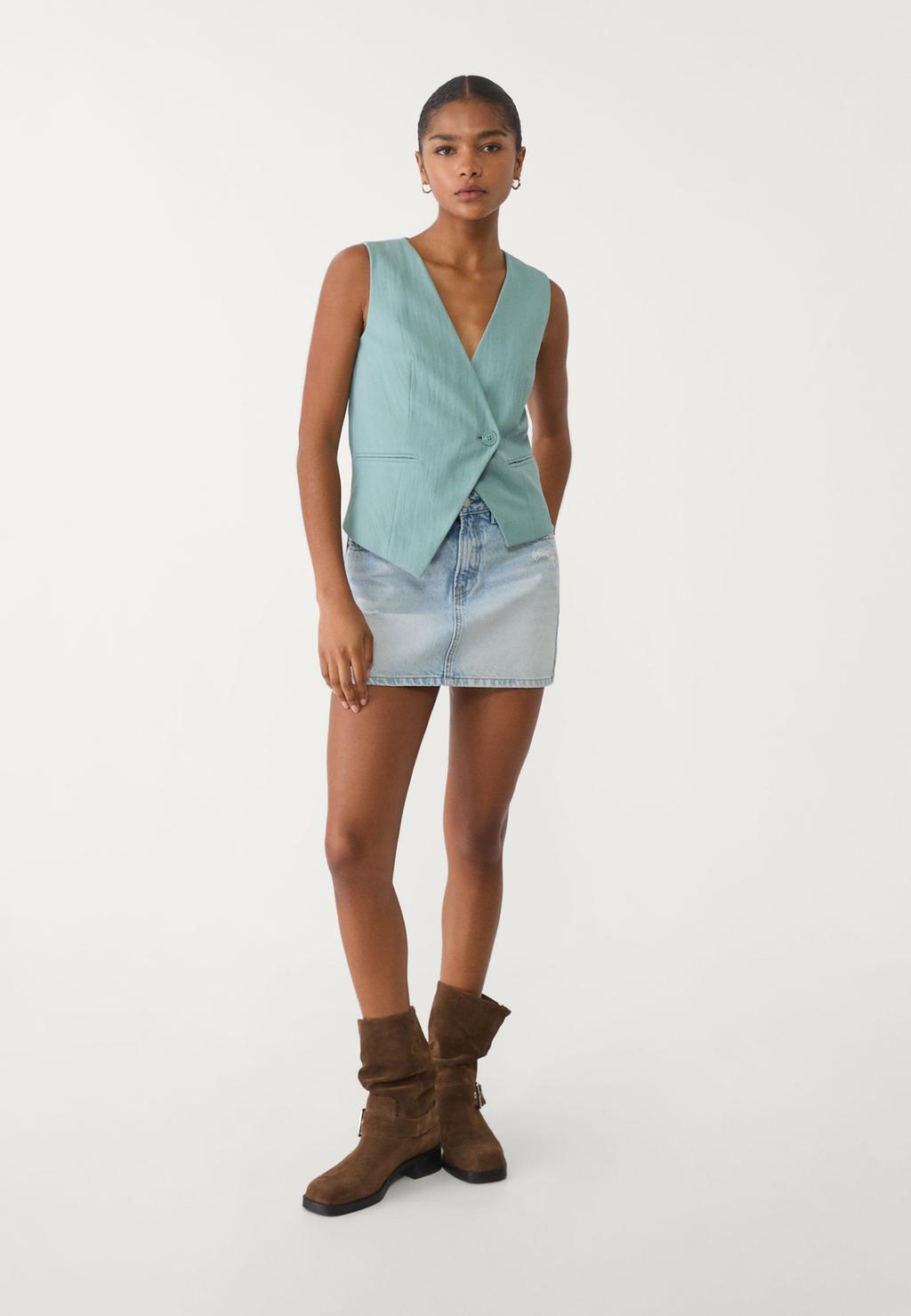 Textured asymmetric vest