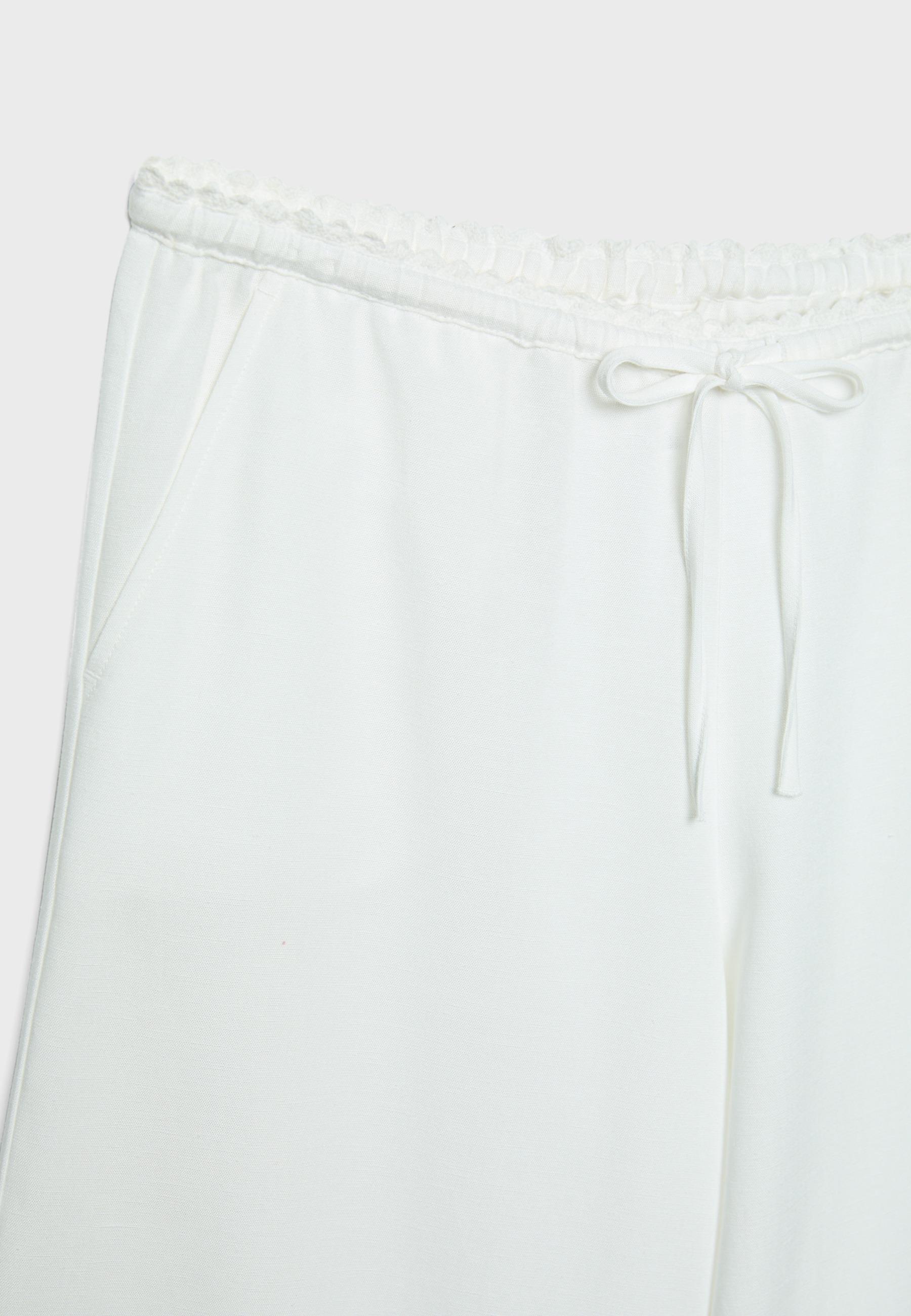 Wide-leg linen-effect trousers — Ecru