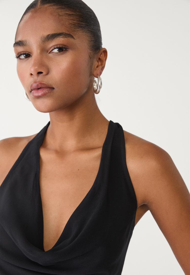 top fluido halter