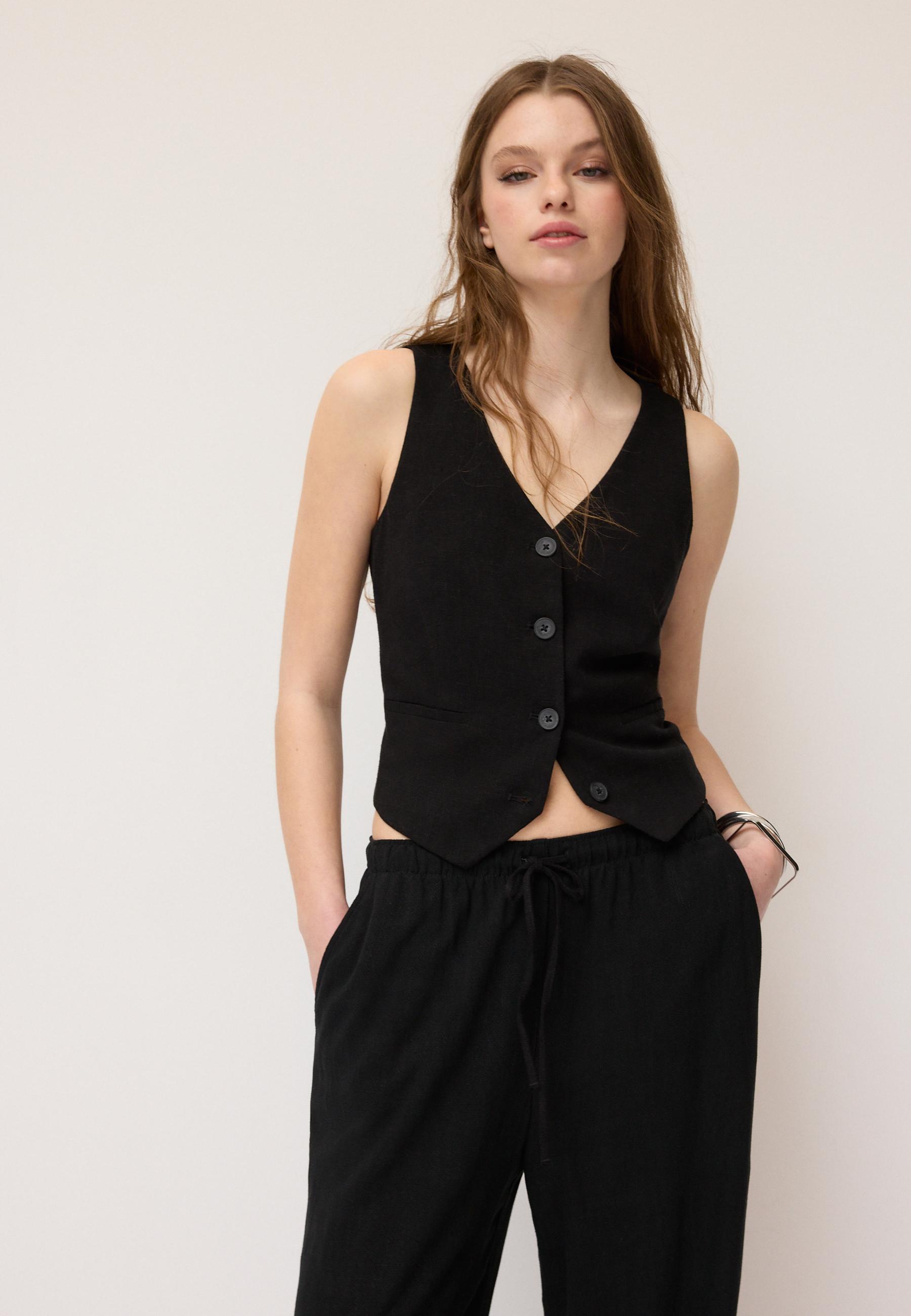 Keten görünümlü düğmeli yelek