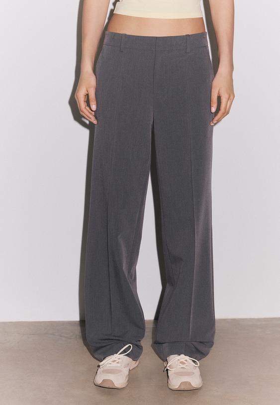 Elegantne Hlače Z Žepi