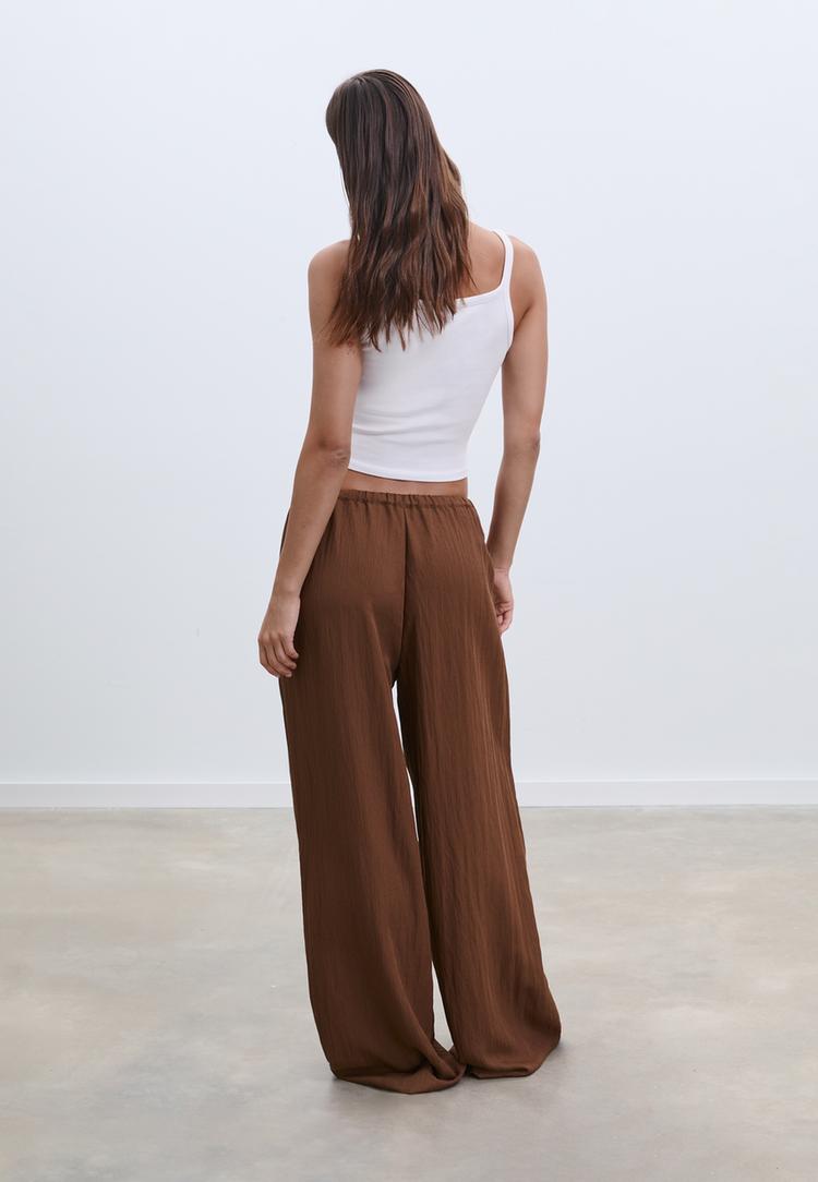 flowing textured trousers with darts