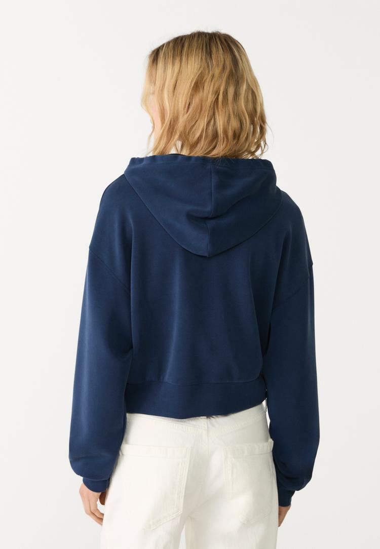 chaqueta con capucha tacto suave