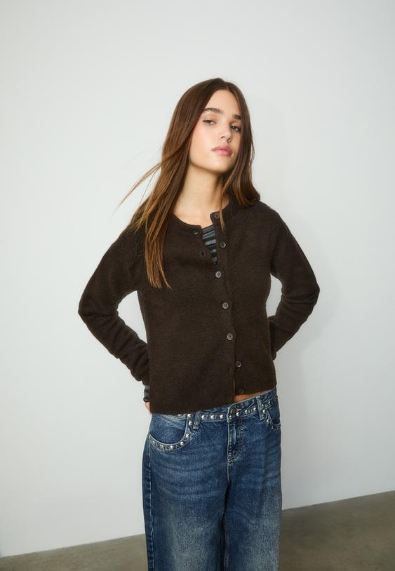 gebreid vest met knopen