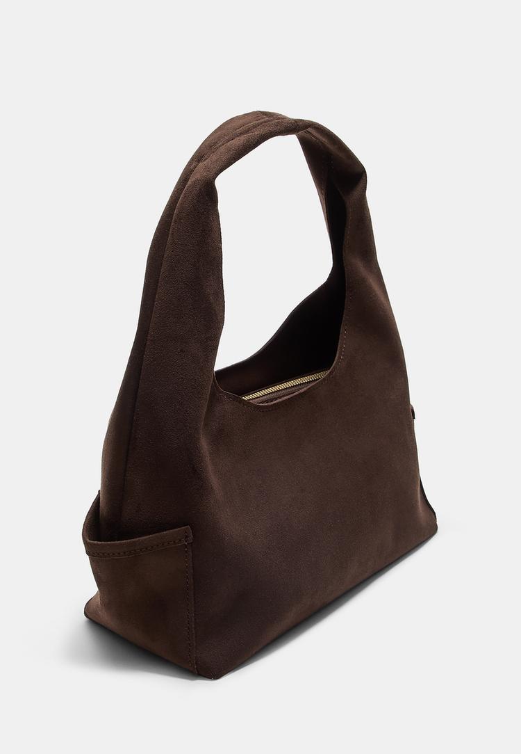 umhangetasche-mit-taschen-in-wildlederimitat