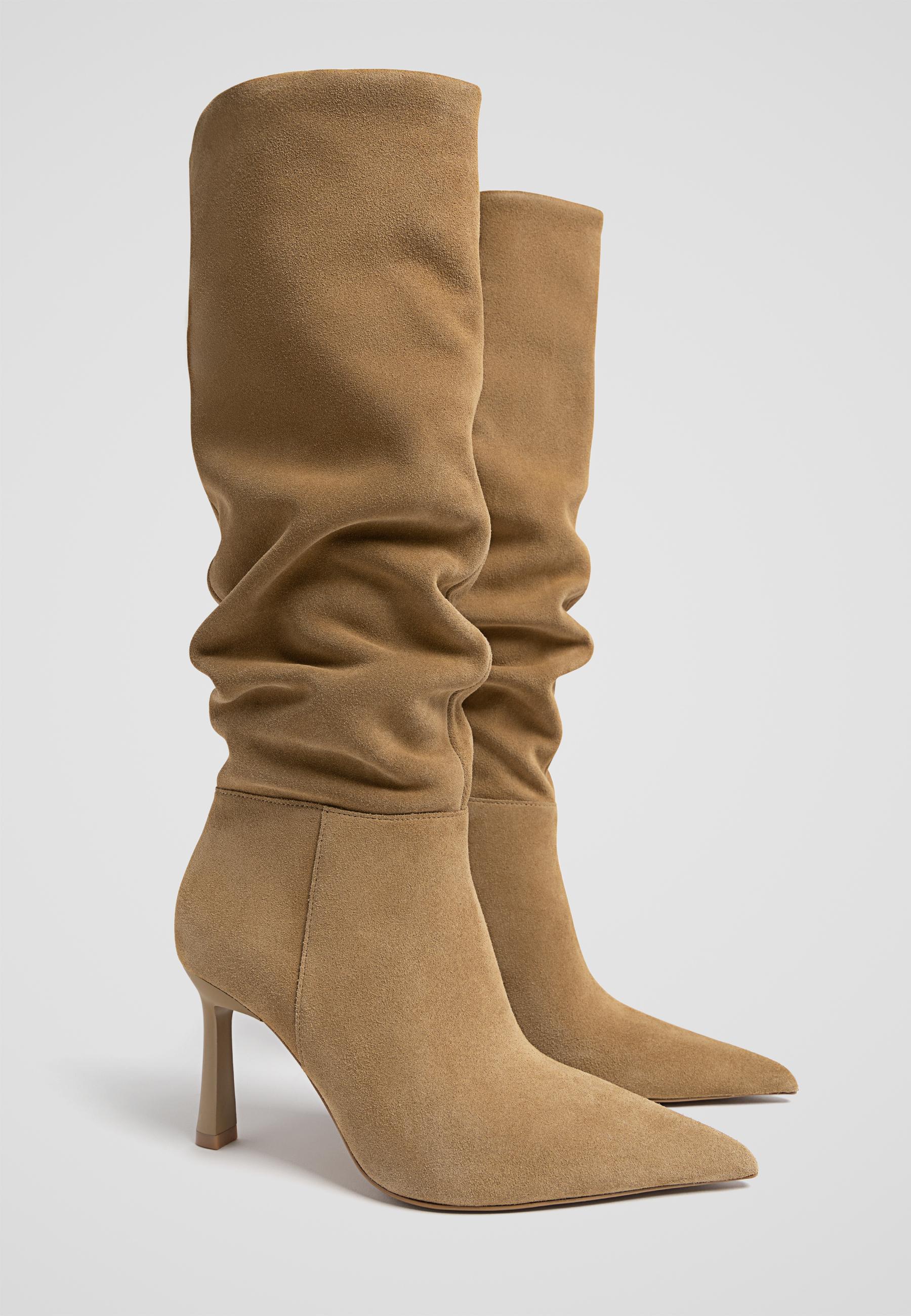 Bottes en croute de cuir a talon aiguille