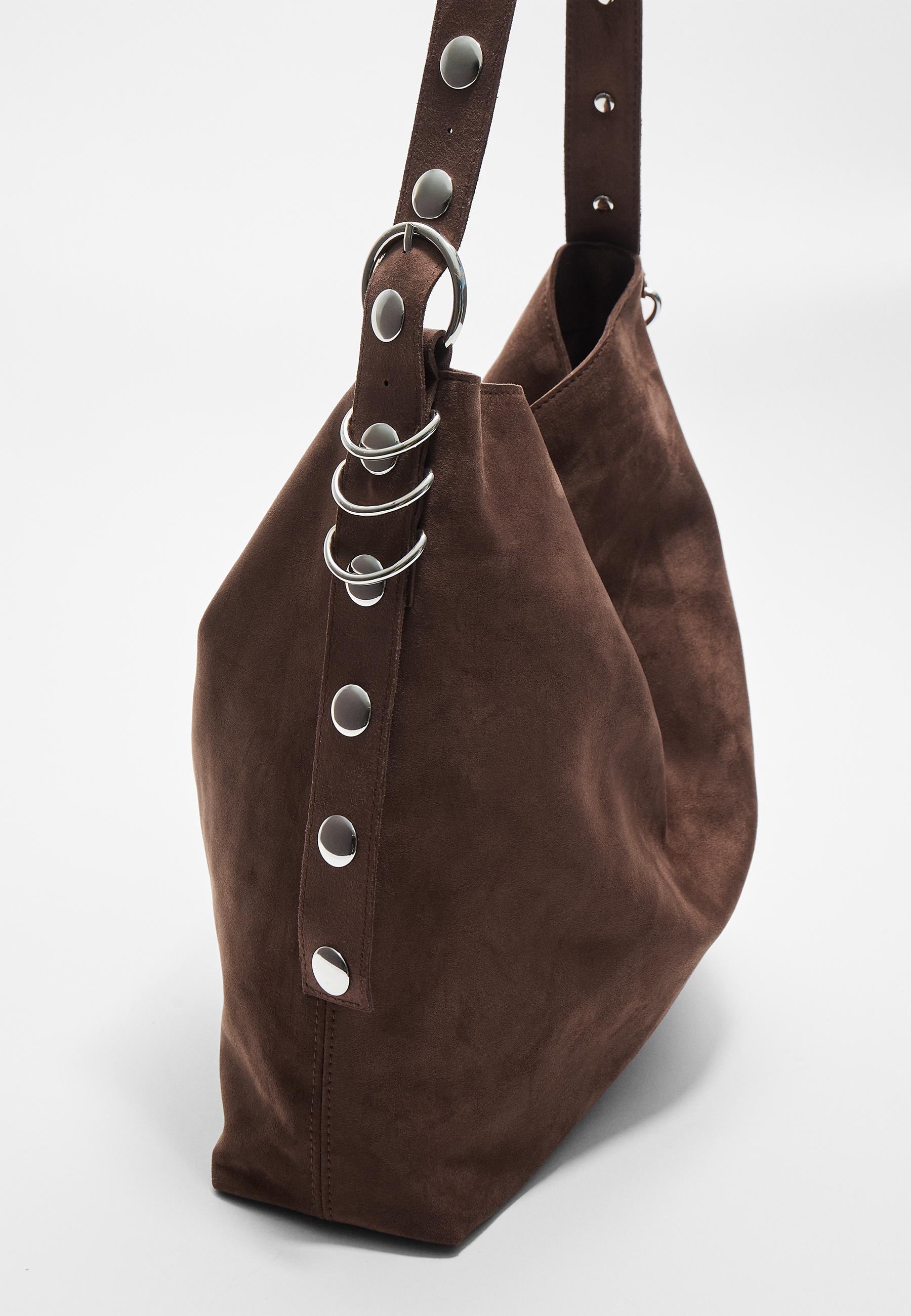 Faux suede bucket bag with strap detail — Brown
