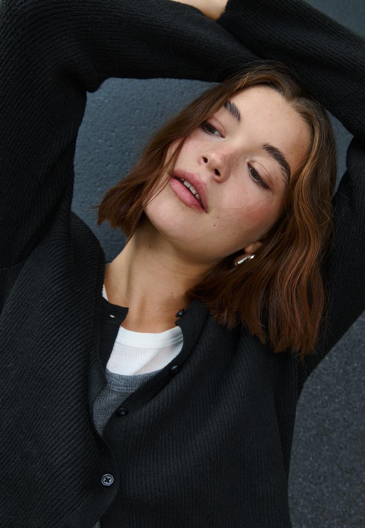cardigan in maglia a costine bottoni