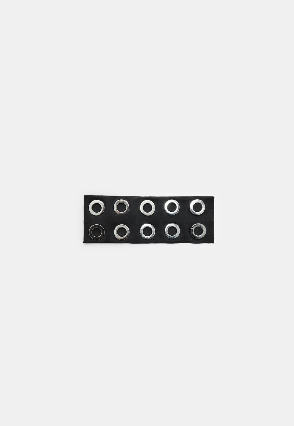 Bandeau de fourrure à œillets