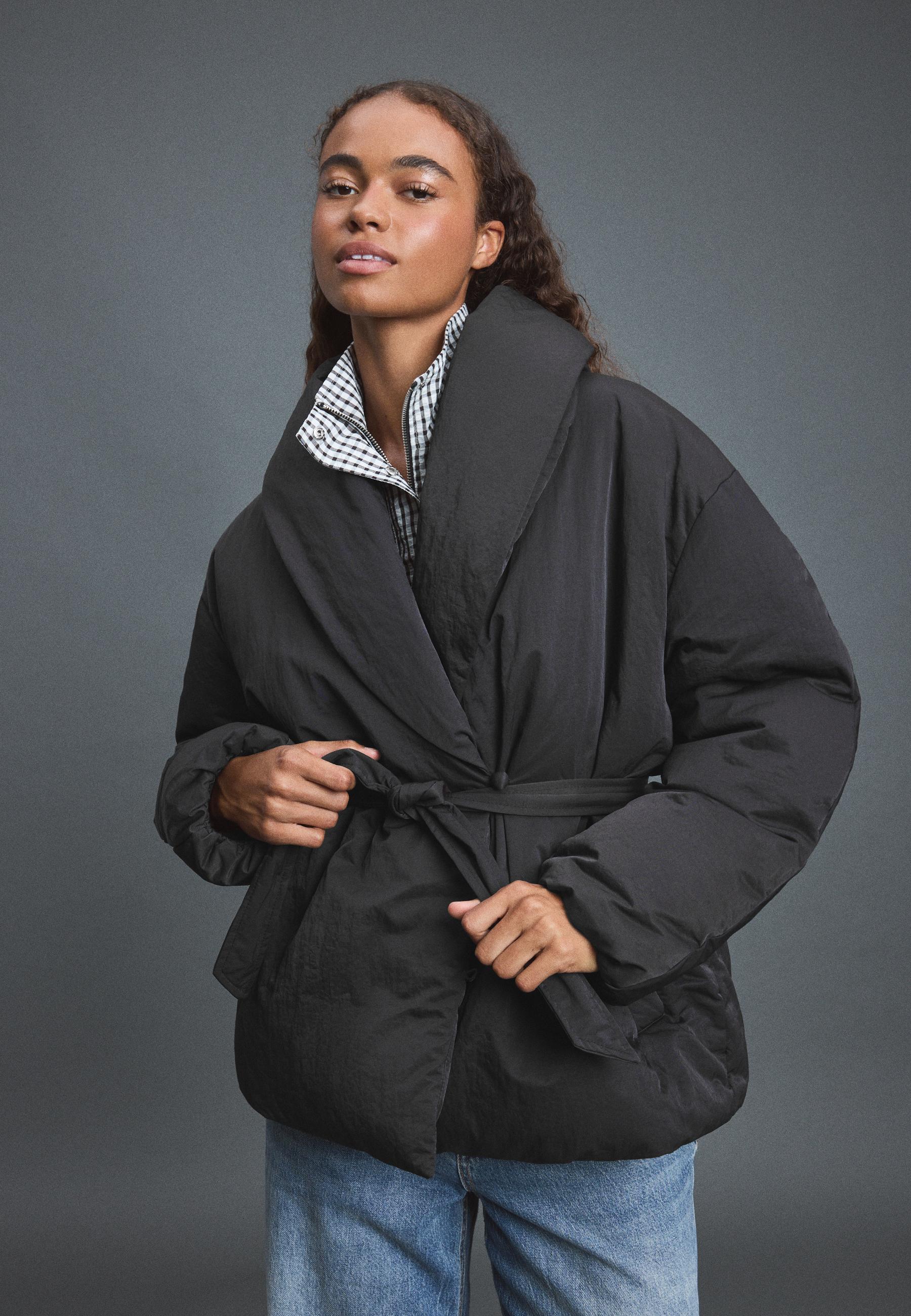 Padded jacket with shawl neck and belt — Black