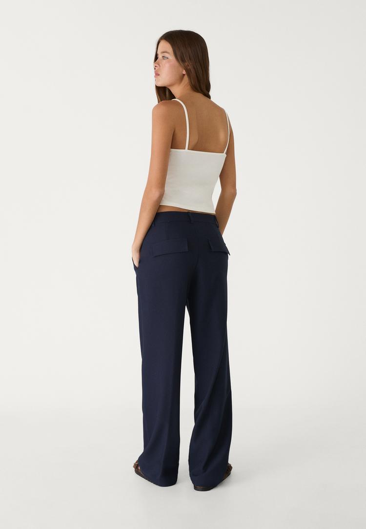 pantalon vestir bolsillos