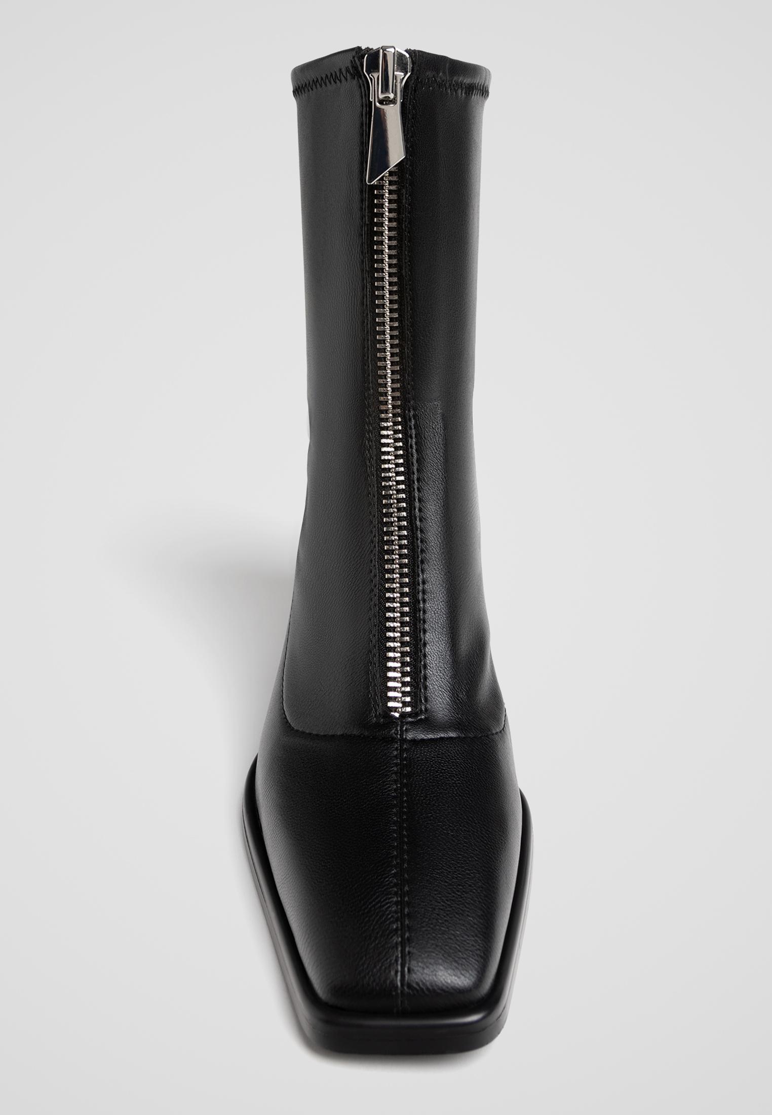 Black boots with front zip best sale