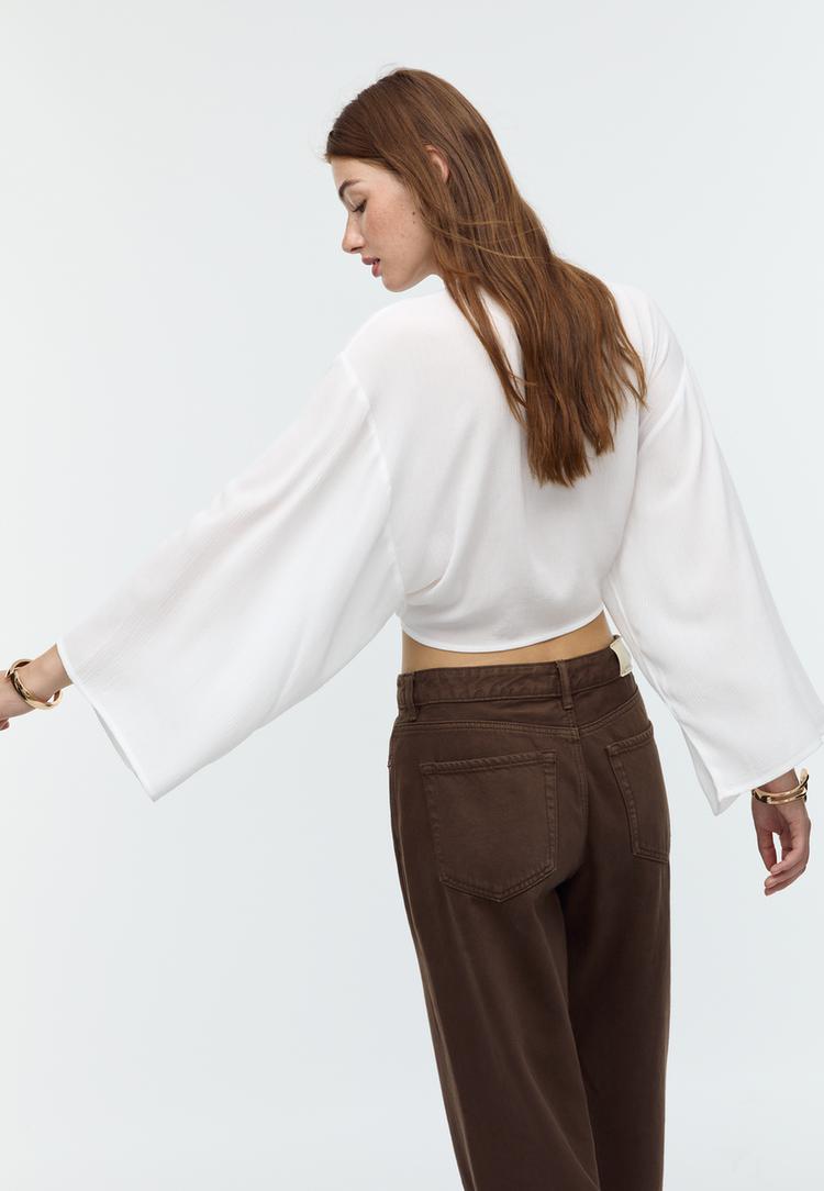blusa fluida nudo