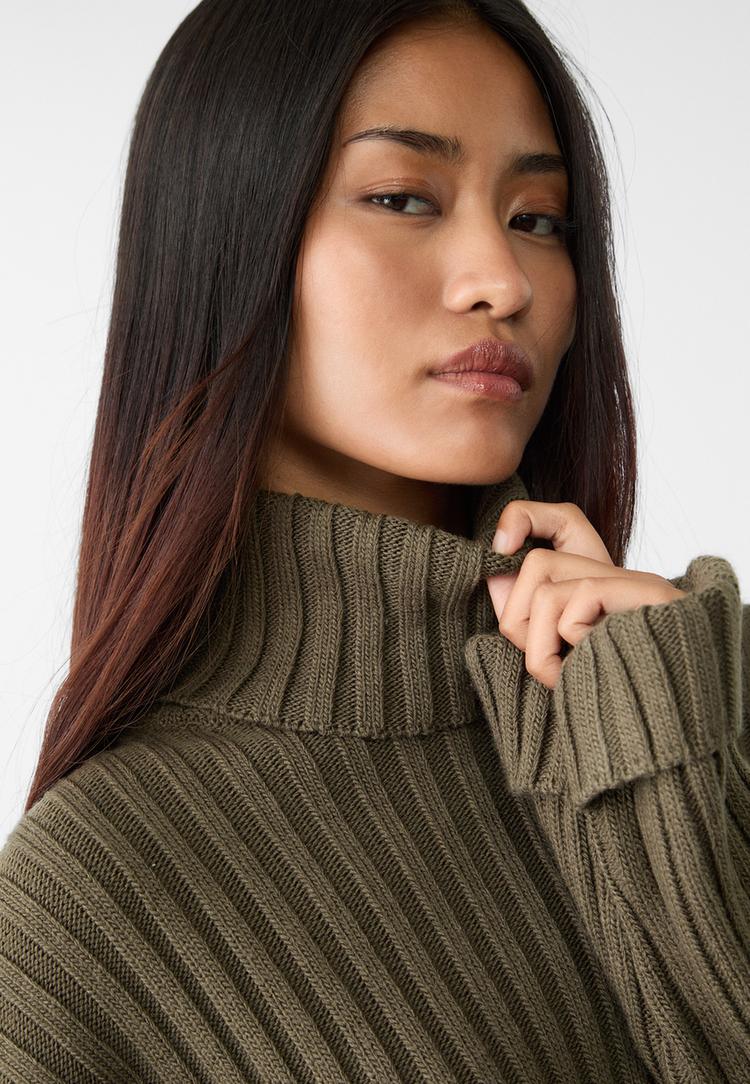knit jumper with raised neck