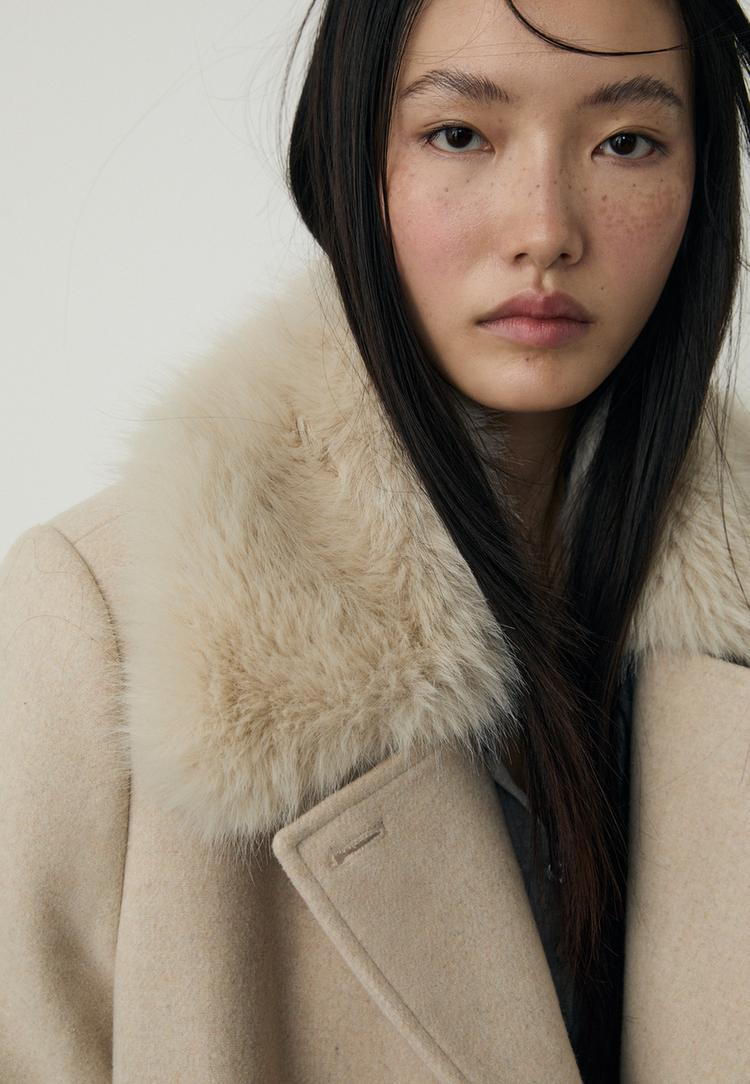 casaco gola com efeito de