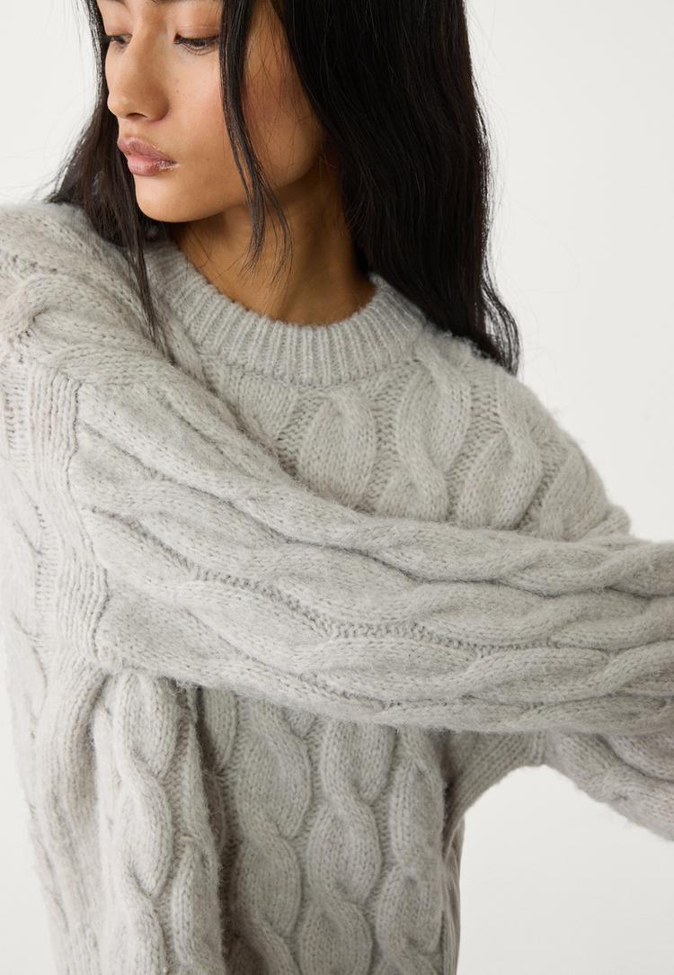 pull cropped en maille tressee