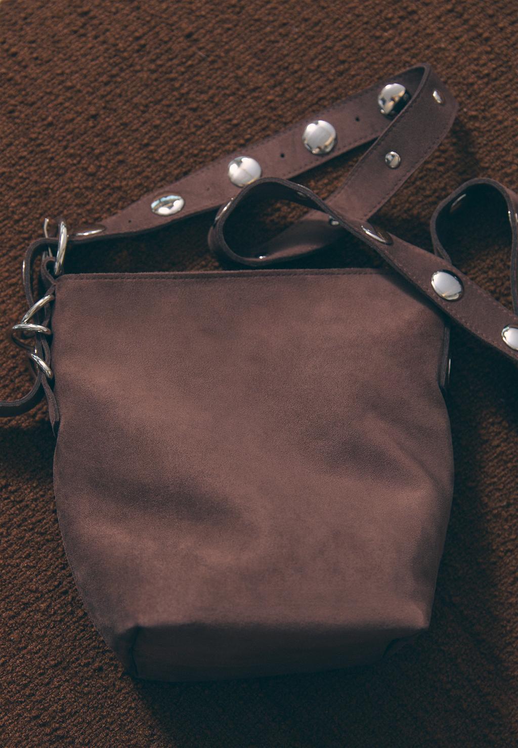 Faux suede crossbody bag with strap detail