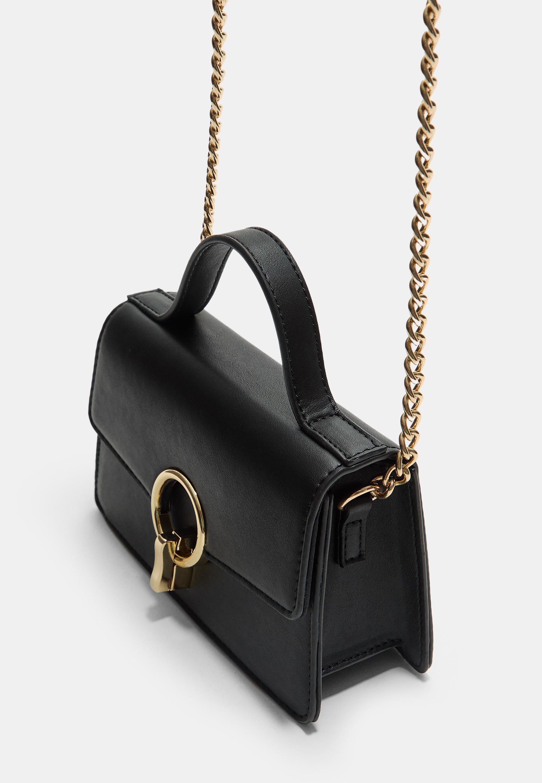 Round-clasp shoulder bag — Black
