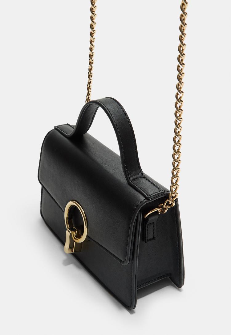 crossbody bag with a round clasp