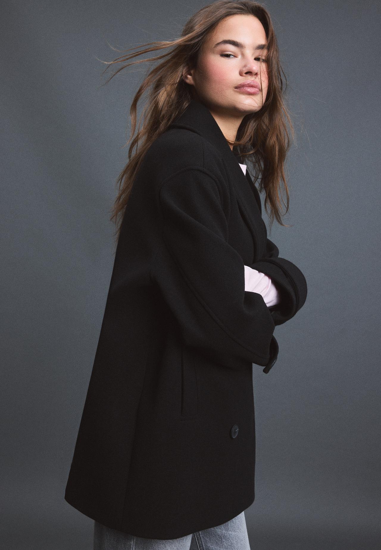 Soft-touch crossover high neck jacket — Black