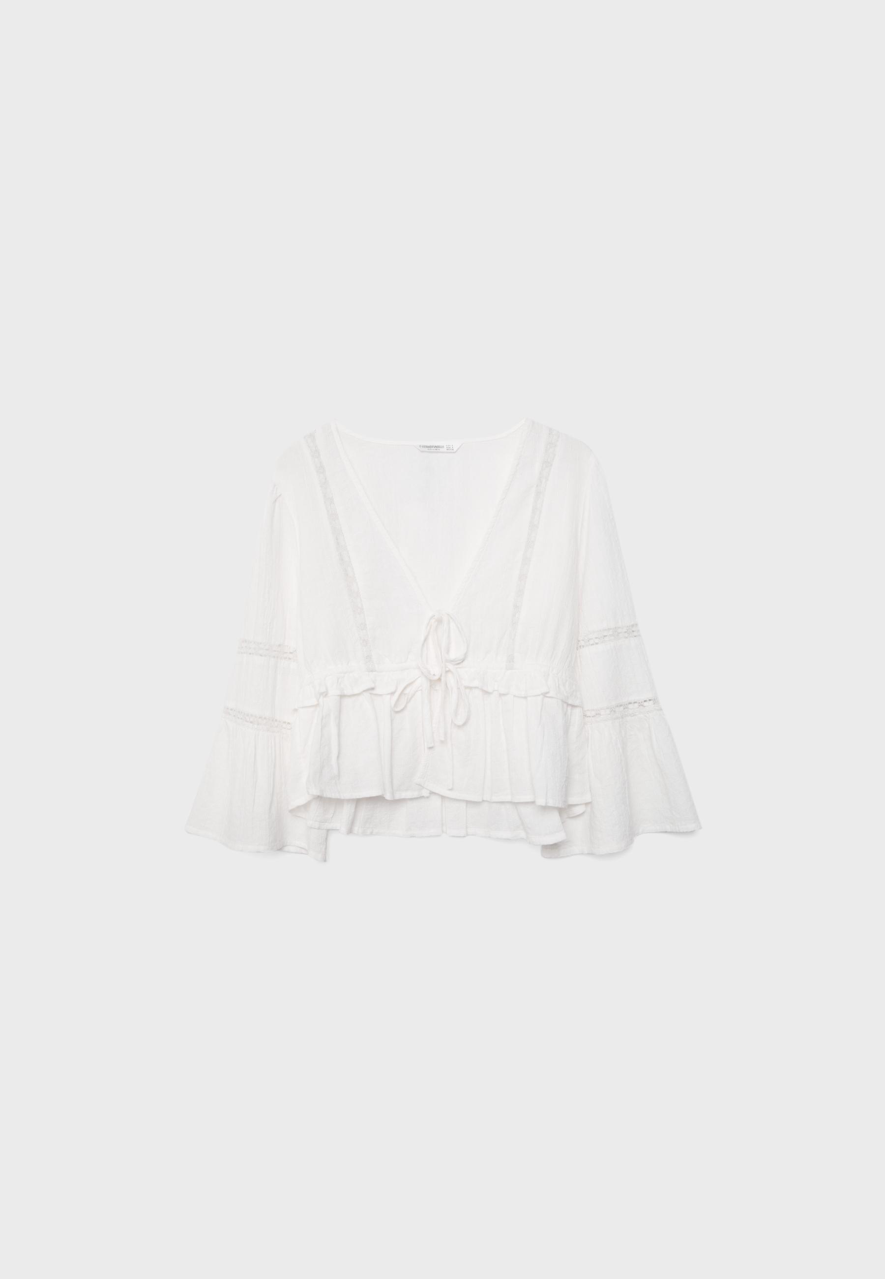 Peplum blouse with ruffles