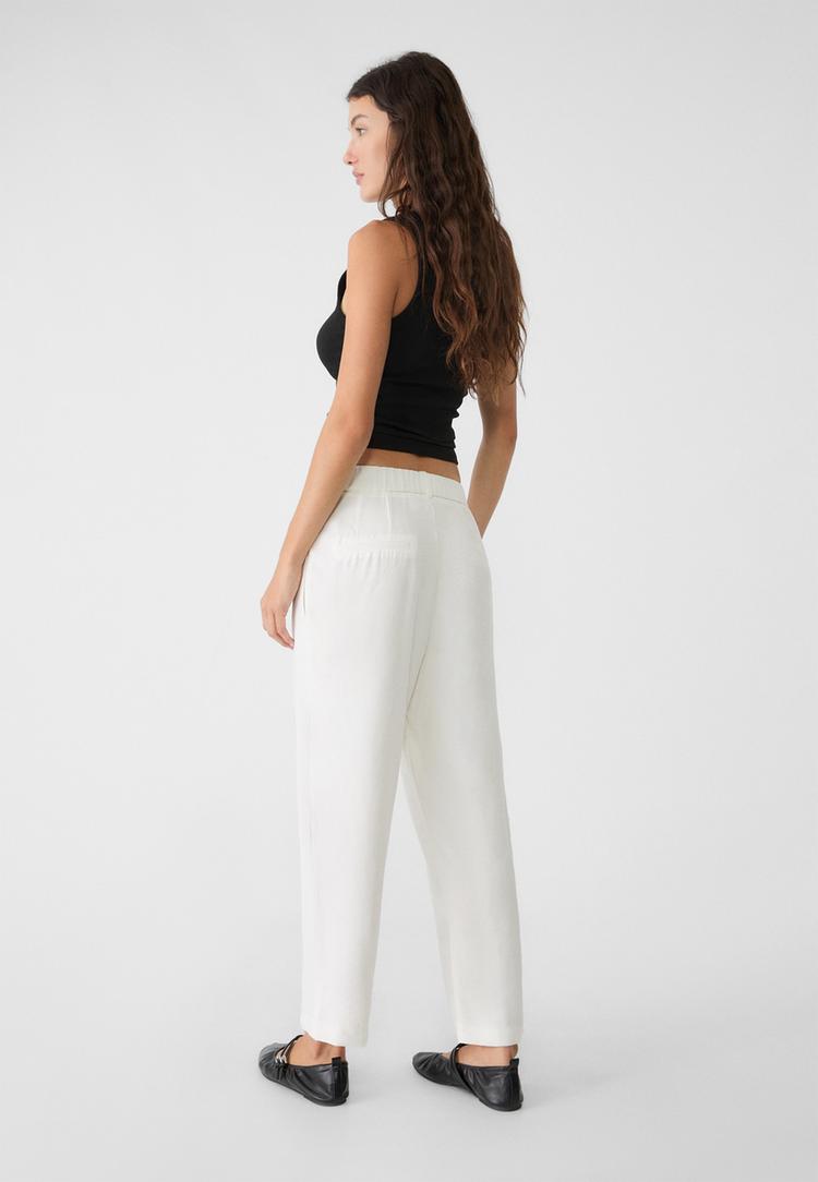 pantaloni carrot fit misto lino