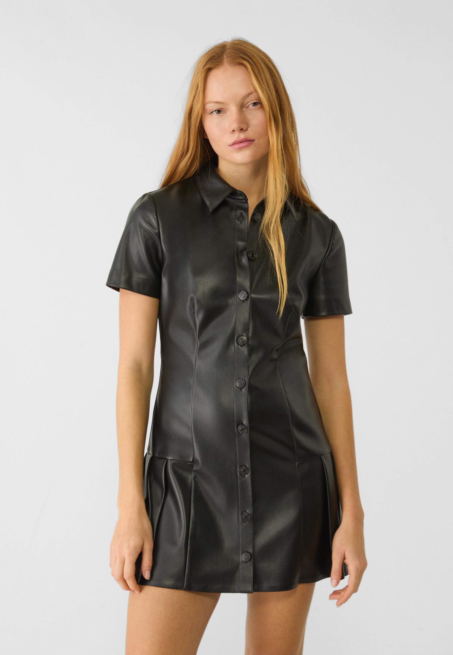 Short leather effect shirt dress with box pleats