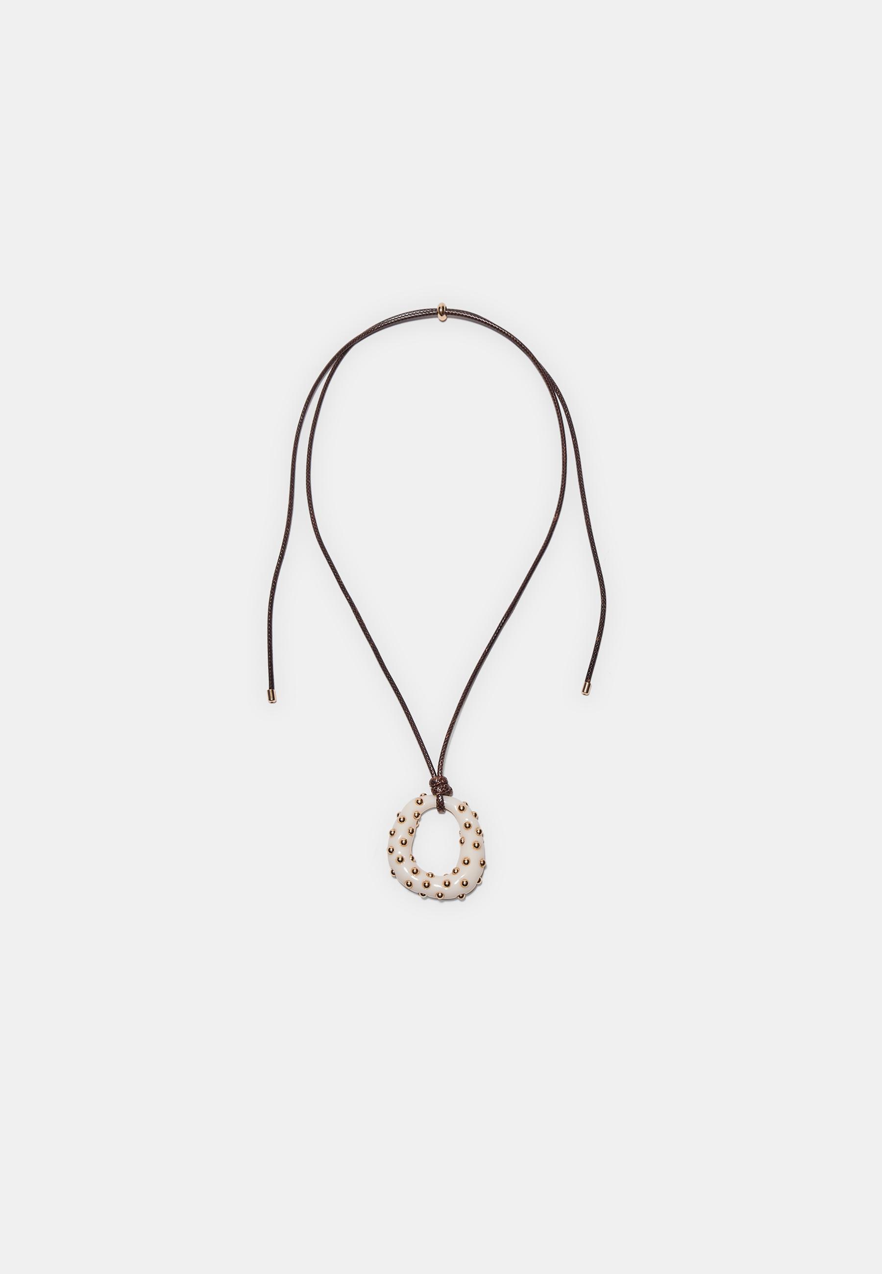 Cord necklace with charm — Ecru