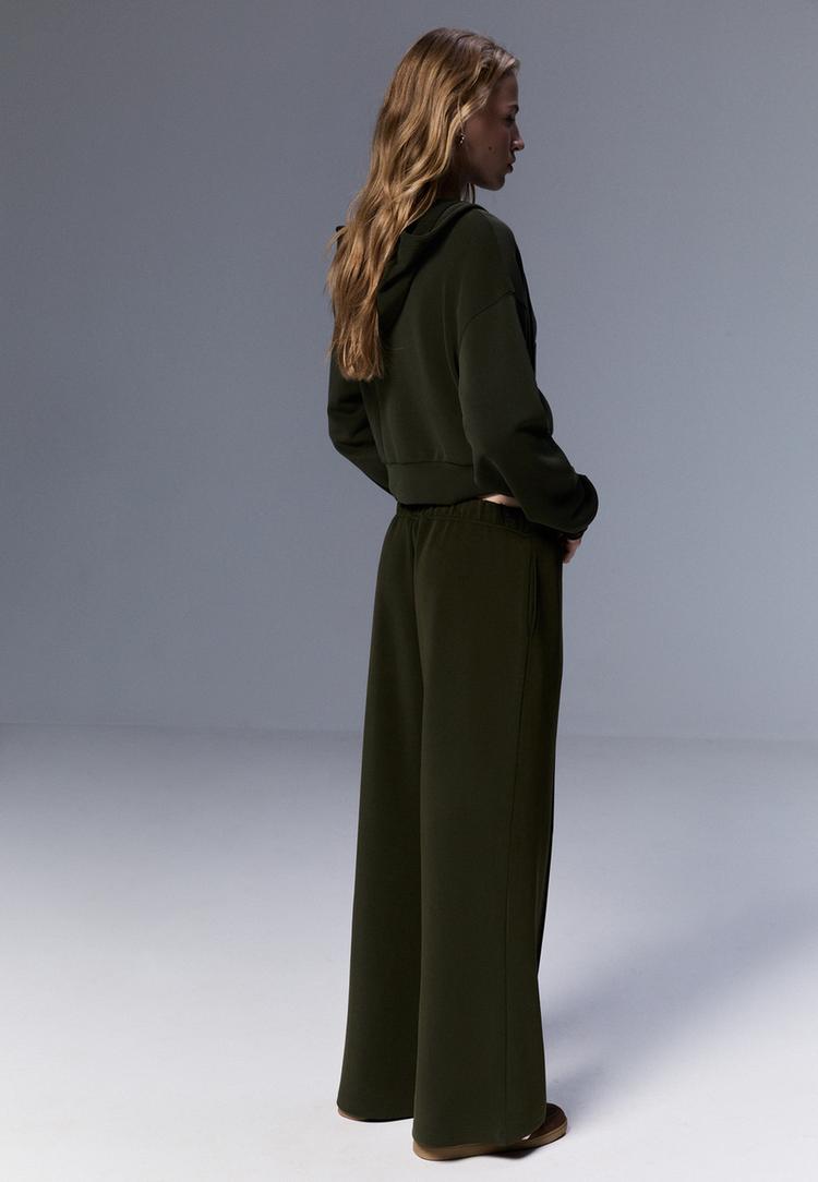 cal%C3%A7as de perna larga com nervura e tato