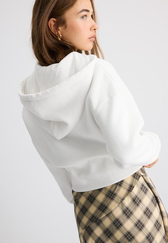 sweatshirt com capuz e fecho de correr