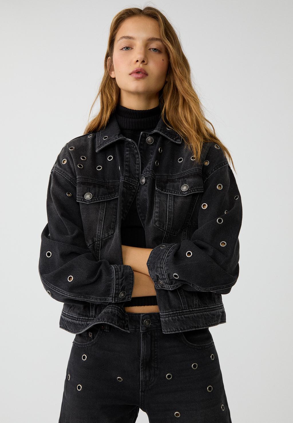 Denim jacket with eyelets