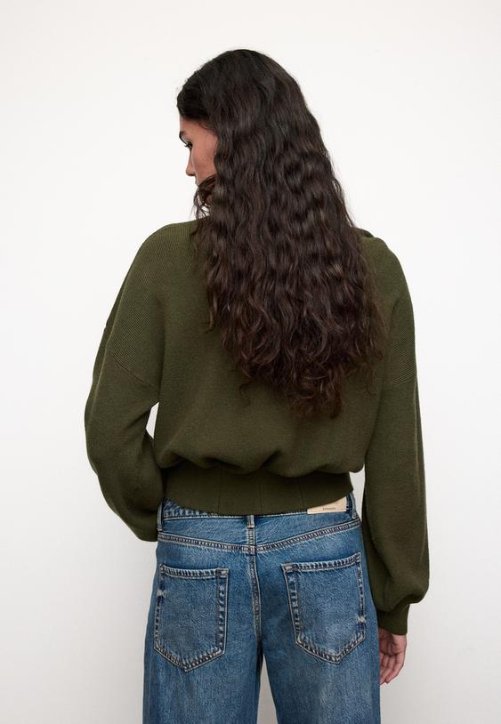 gebreide trui met opstaande kraag